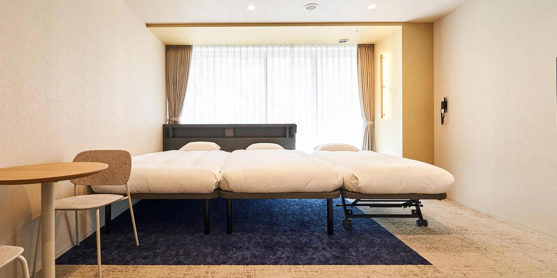 Bed in Princess Garden Hotel