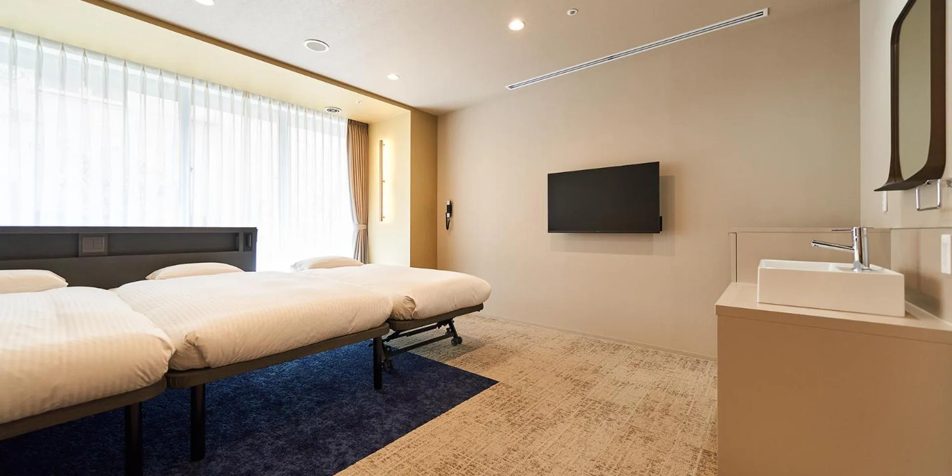 Bed in Princess Garden Hotel