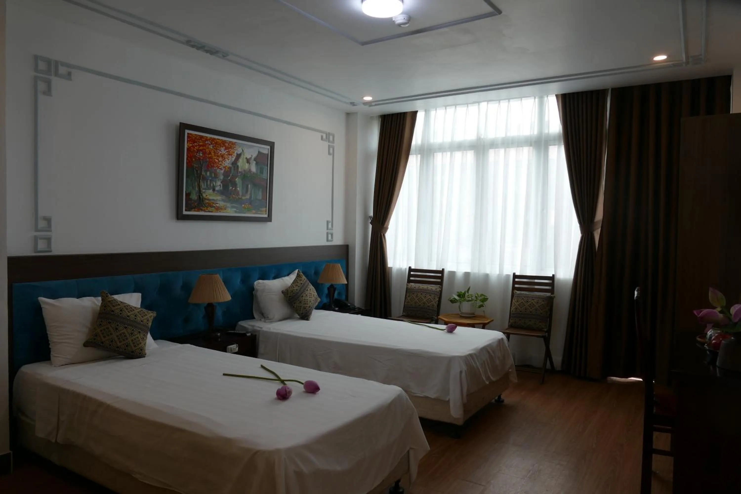 Bed in MH Hanoi Hotel