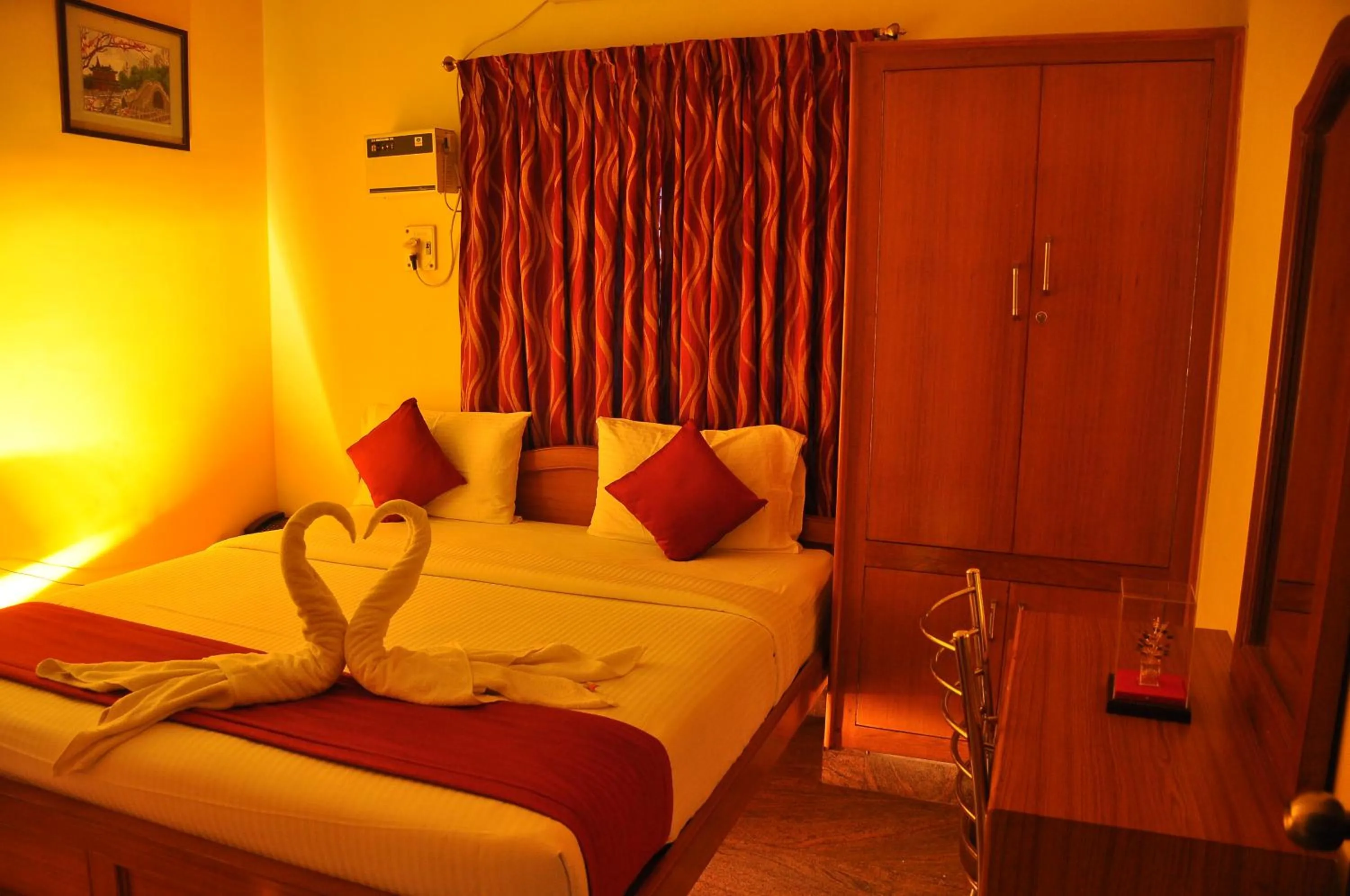 Bed in Green Grande Inn