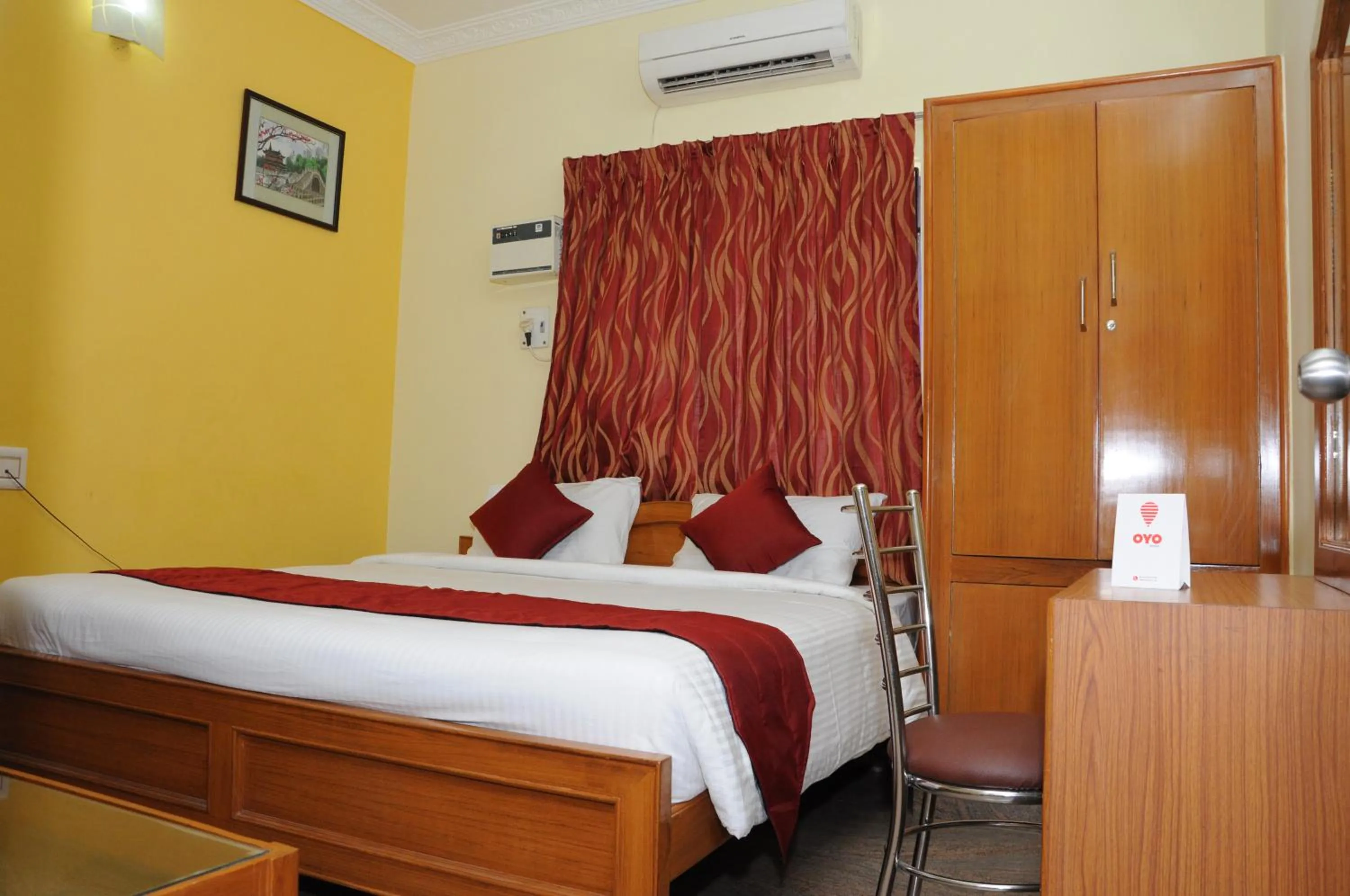 Bed in Green Grande Inn