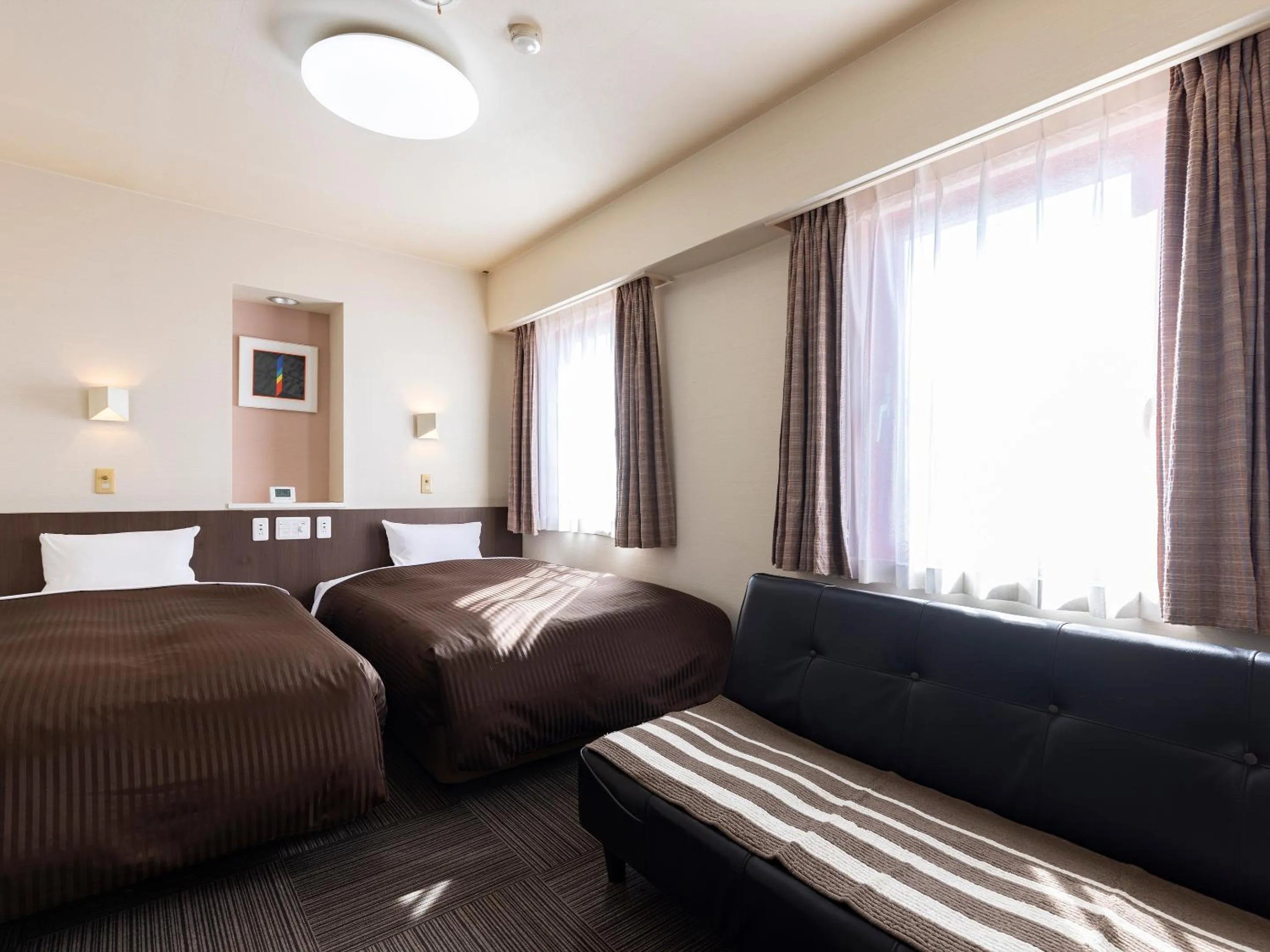 Photo of the whole room, Bed in KOKO STAY Izumi - formerly Hotel Wing International Izumi
