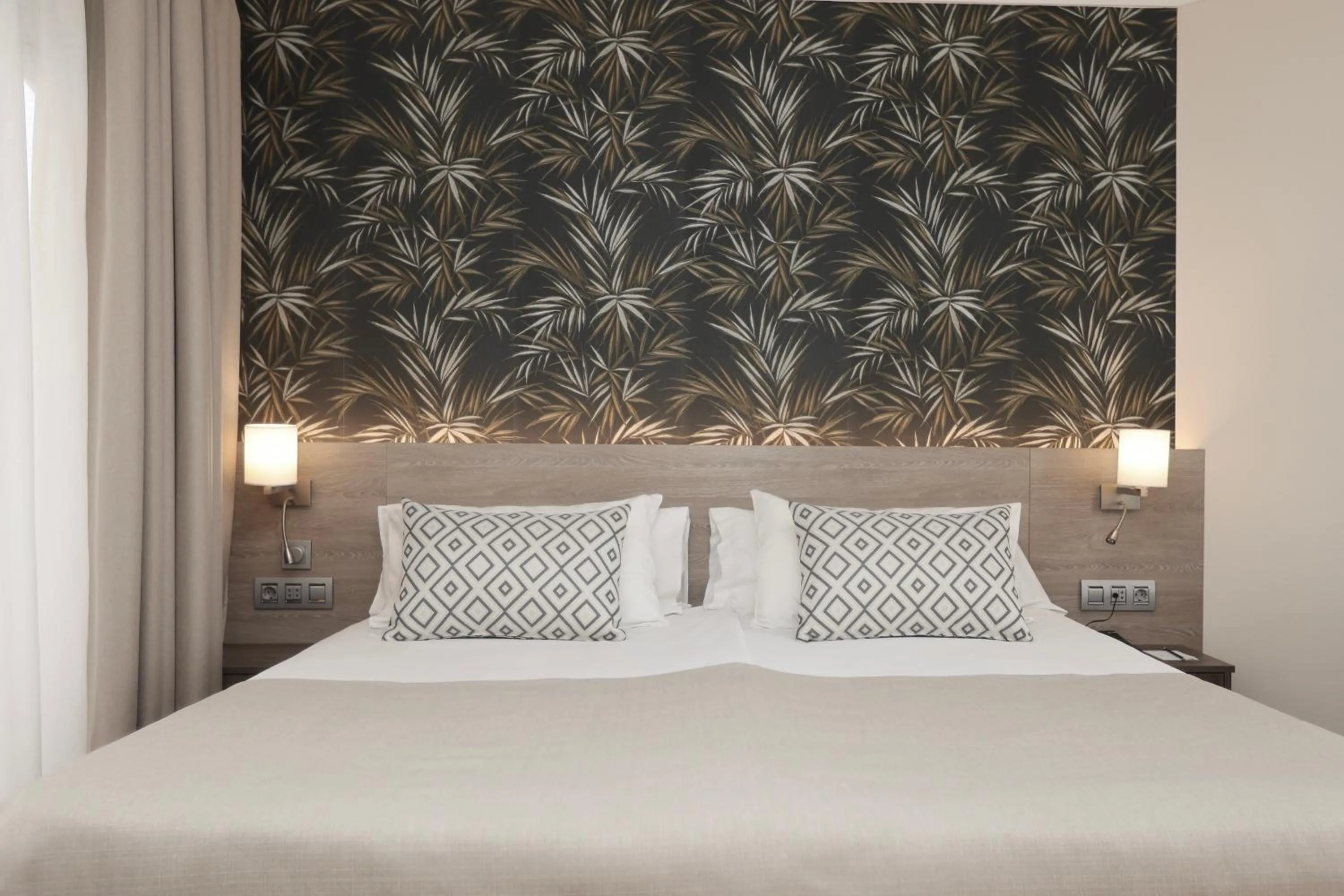 Bed in Hotel Puerto Palace