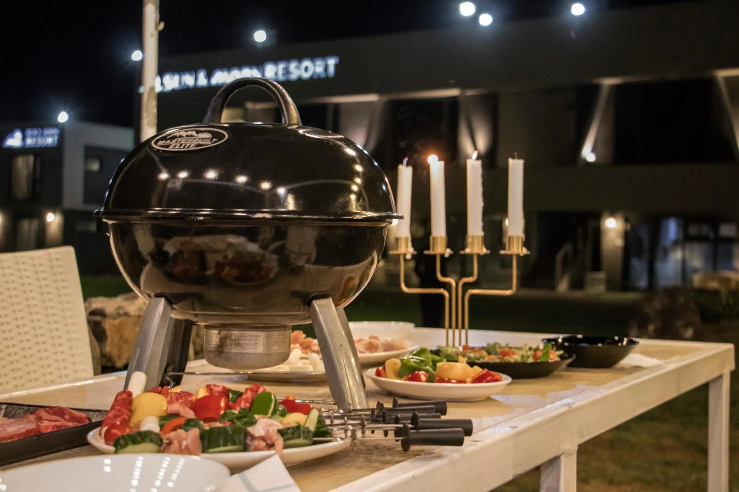 Property logo or sign in Sun and Moon Resort