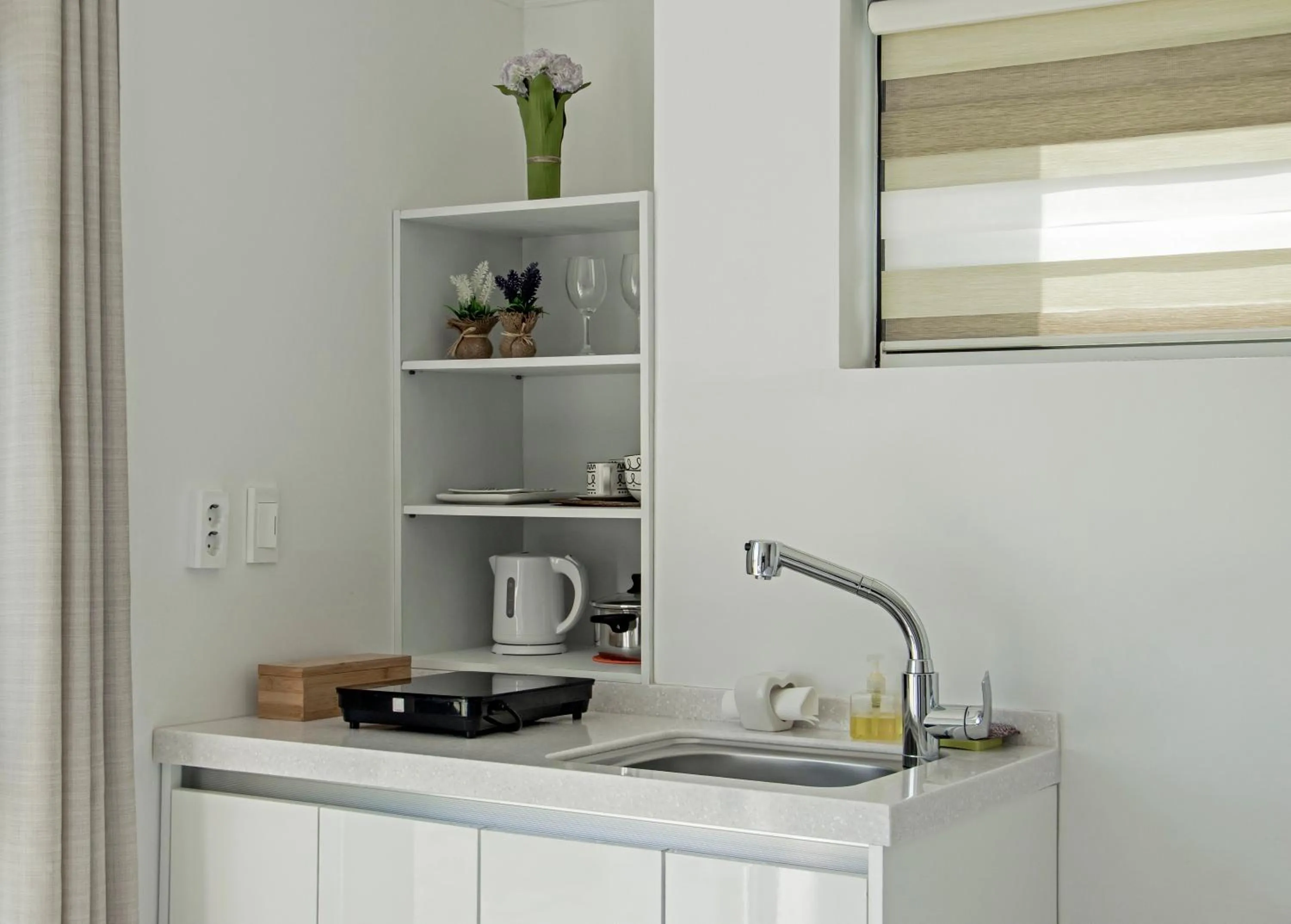 Kitchen or kitchenette in Sun and Moon Resort