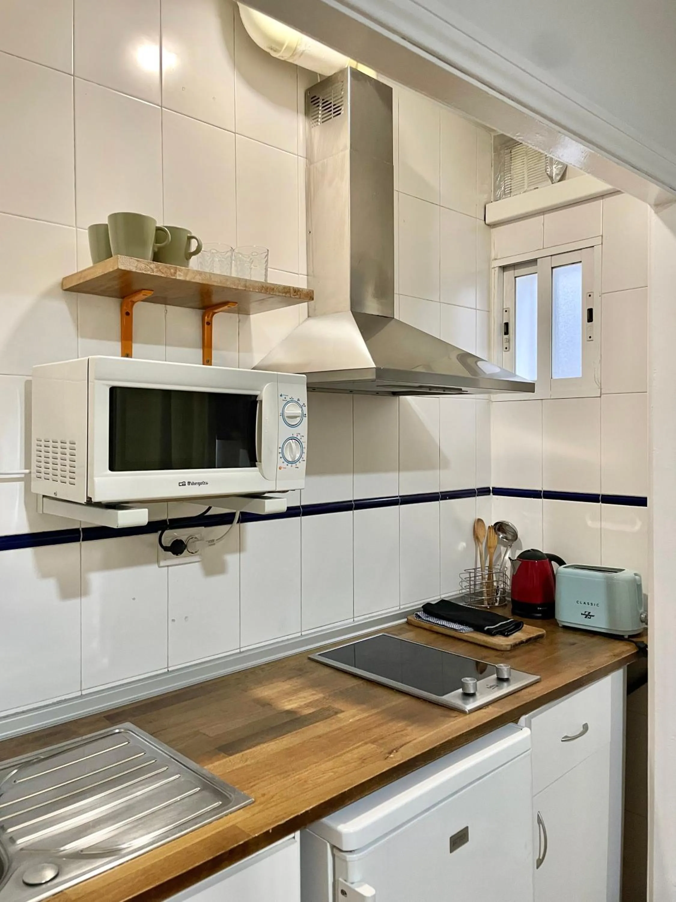 Kitchen or kitchenette in Apartamentos Mayor Centro