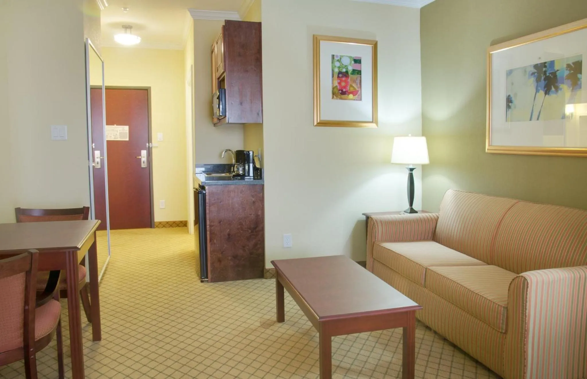 Bedroom in Holiday Inn Express Hotel & Suites Winnie by IHG