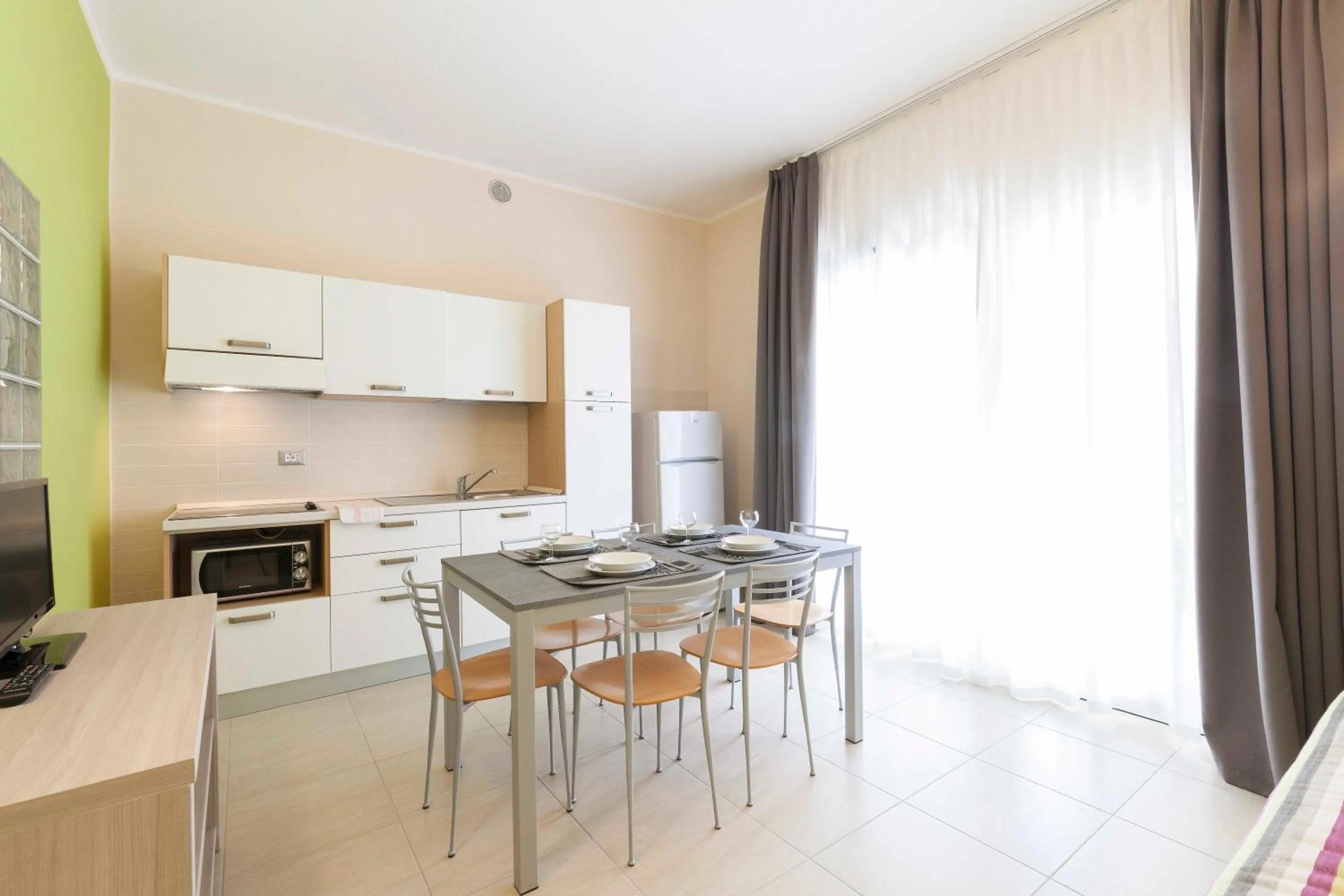 Kitchen or kitchenette in Diano Sporting Apartments