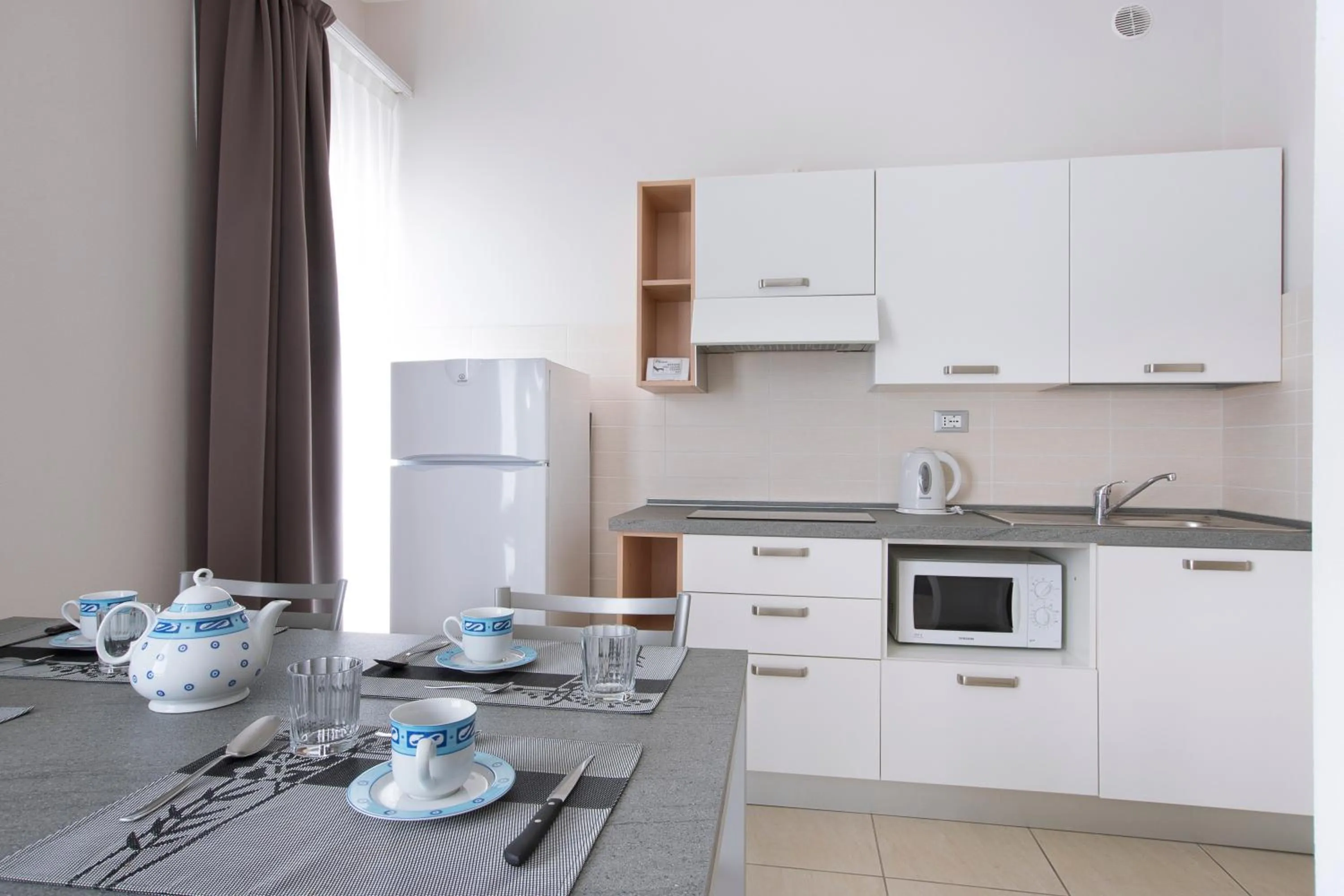 Kitchen or kitchenette in Diano Sporting Apartments