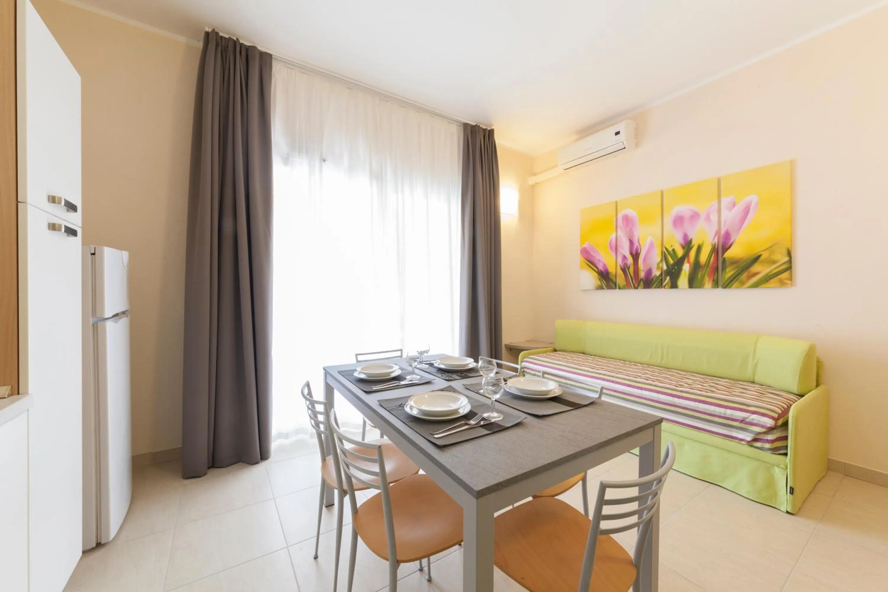 Living room in Diano Sporting Apartments