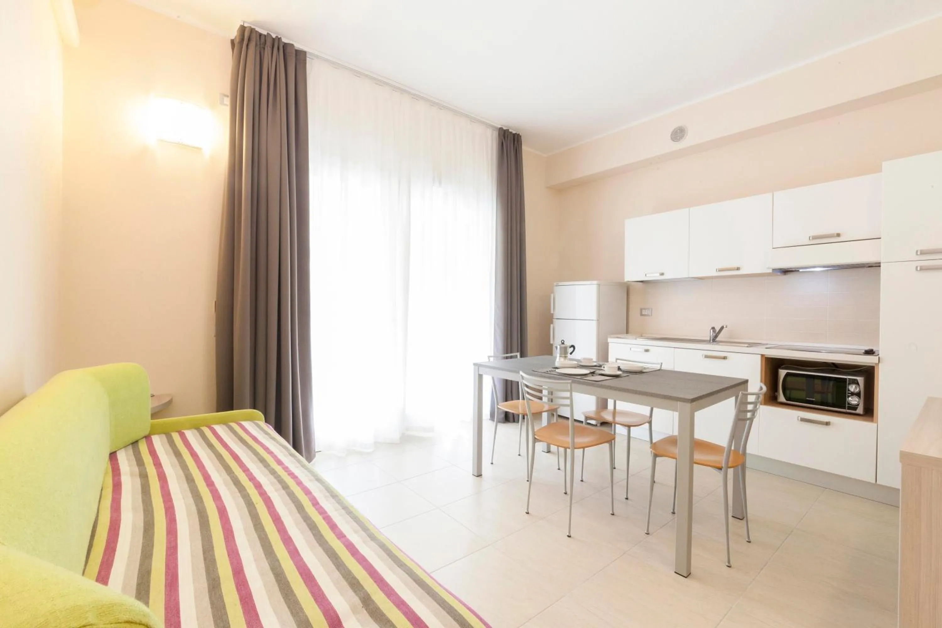 Living room in Diano Sporting Apartments