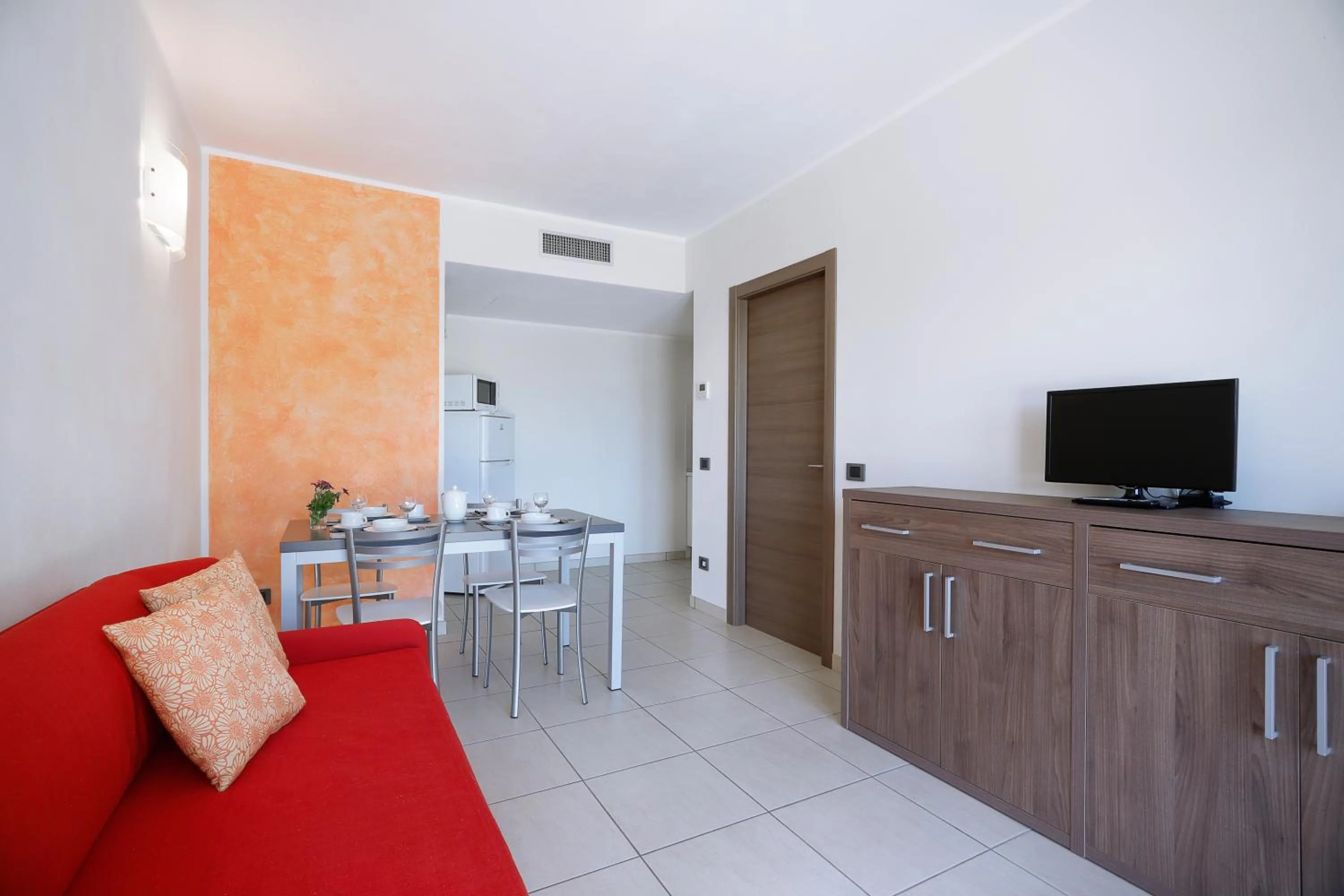 Living room in Diano Sporting Apartments