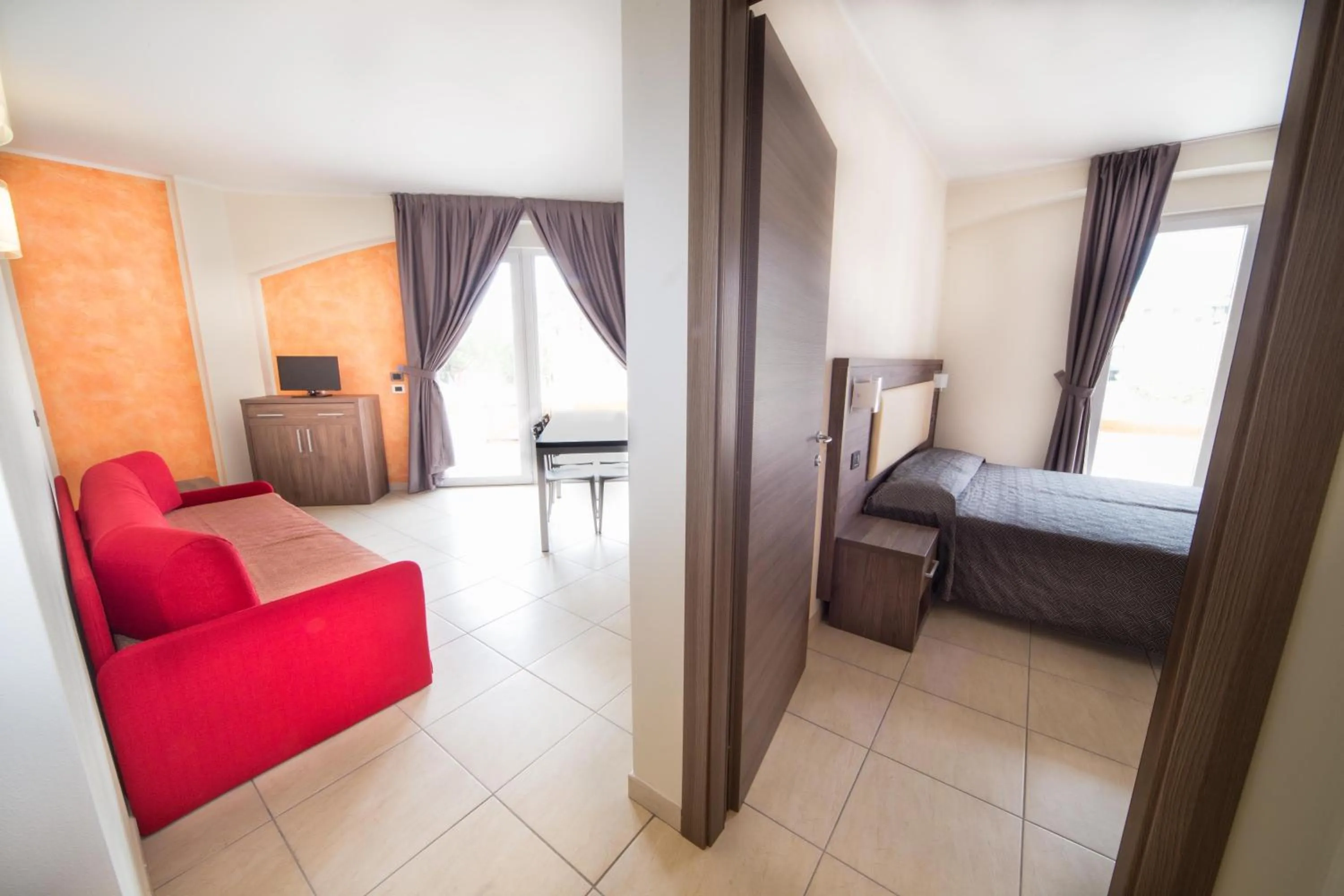 Photo of the whole room, Bed in Diano Sporting Apartments