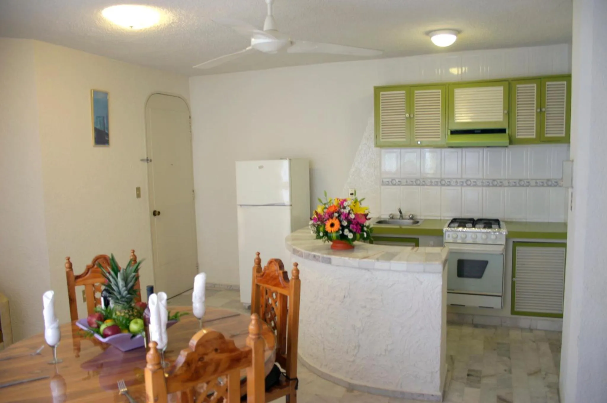 Kitchen or kitchenette in Hotel Suites Jazmín Acapulco