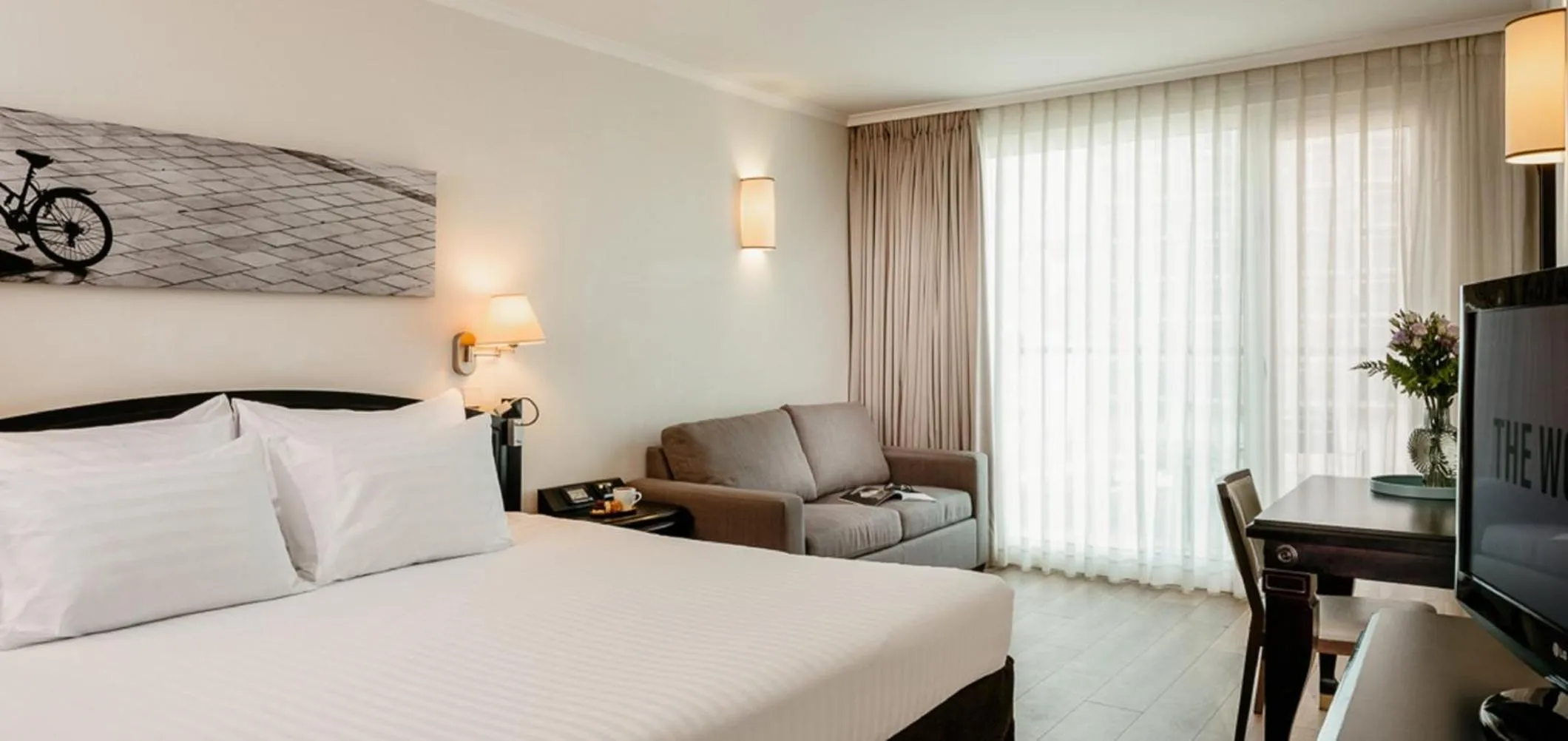 Photo of the whole room, Bed in Crowne Plaza Tel Aviv Beach by IHG