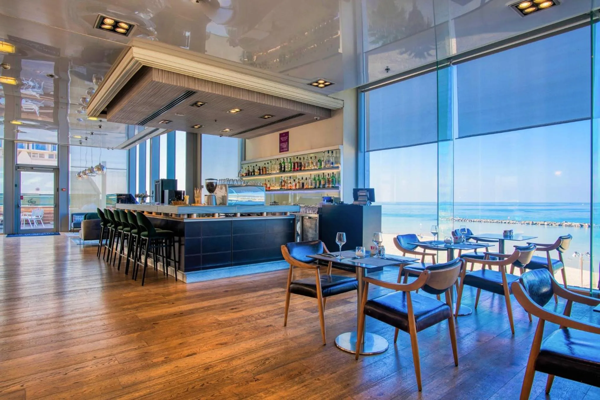 Lounge or bar in Crowne Plaza Tel Aviv Beach by IHG