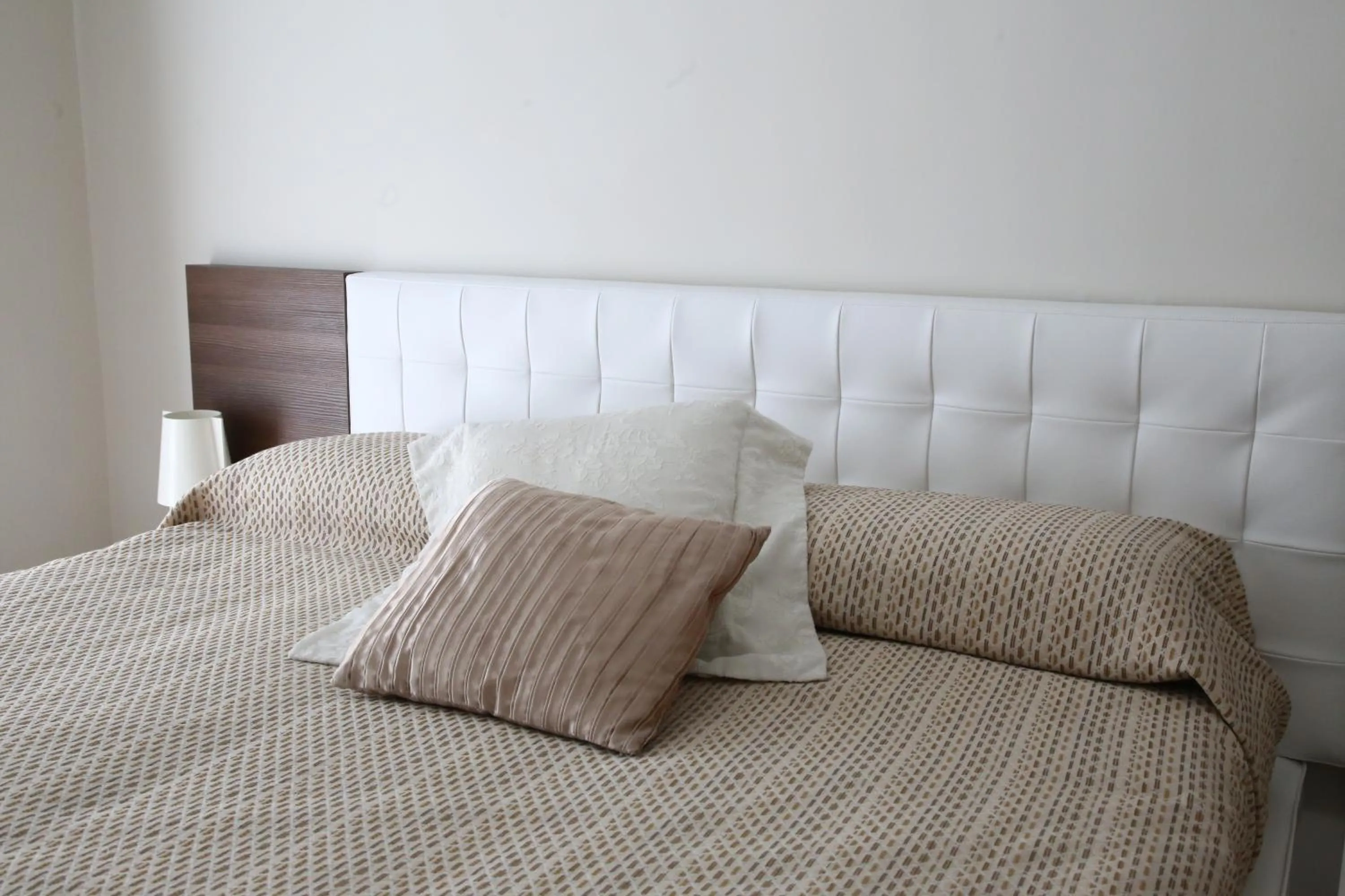 Bed in Sorrento Coast Suites B&B