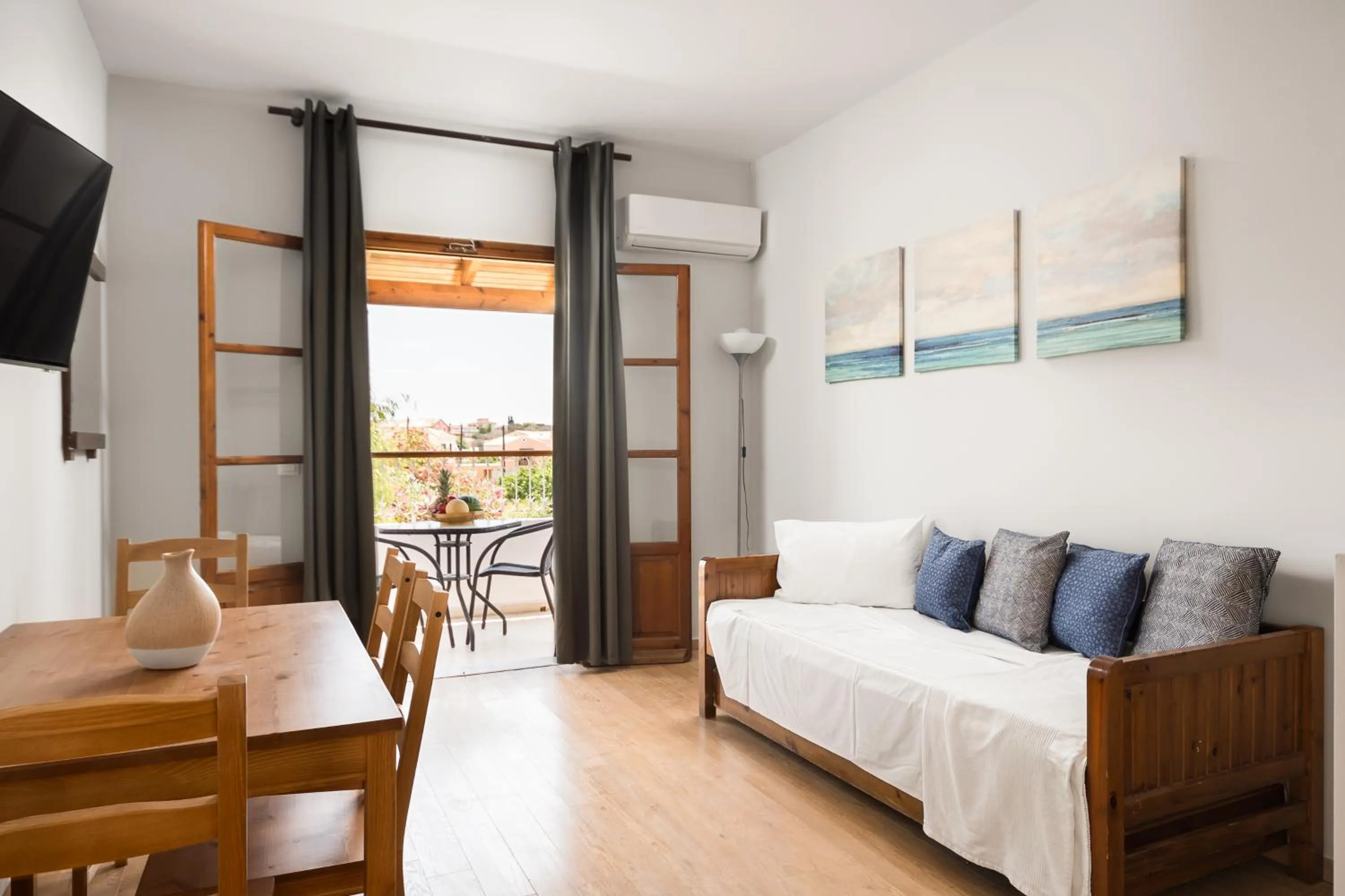 Living room, Bed in Folies Corfu Town Hotel Apartments