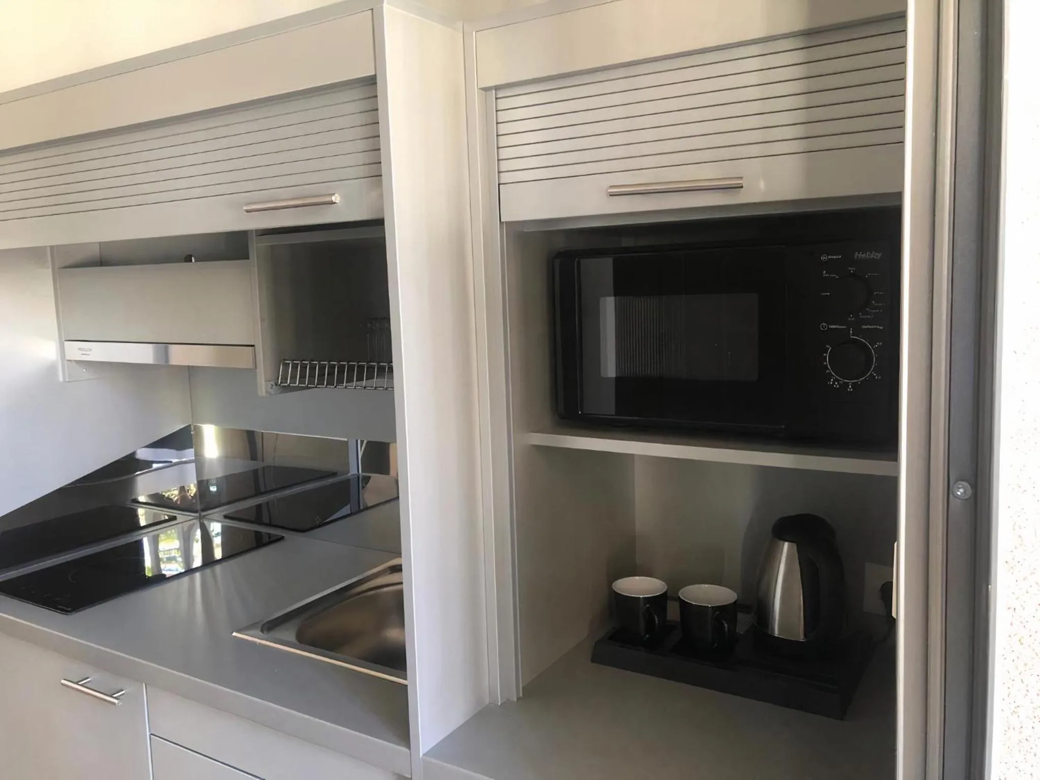 Kitchen or kitchenette in Folies Corfu Town Hotel Apartments