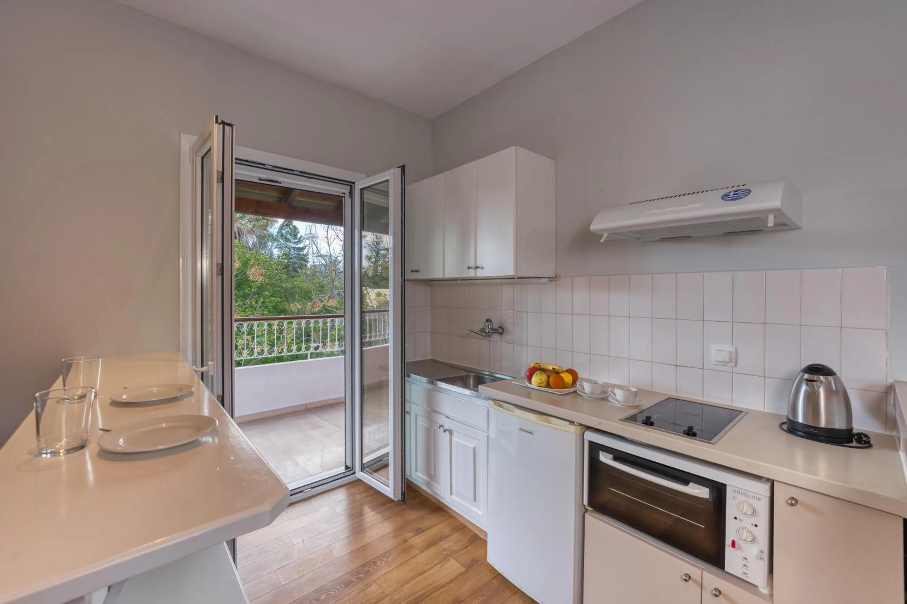 Kitchen or kitchenette in Folies Corfu Town Hotel Apartments