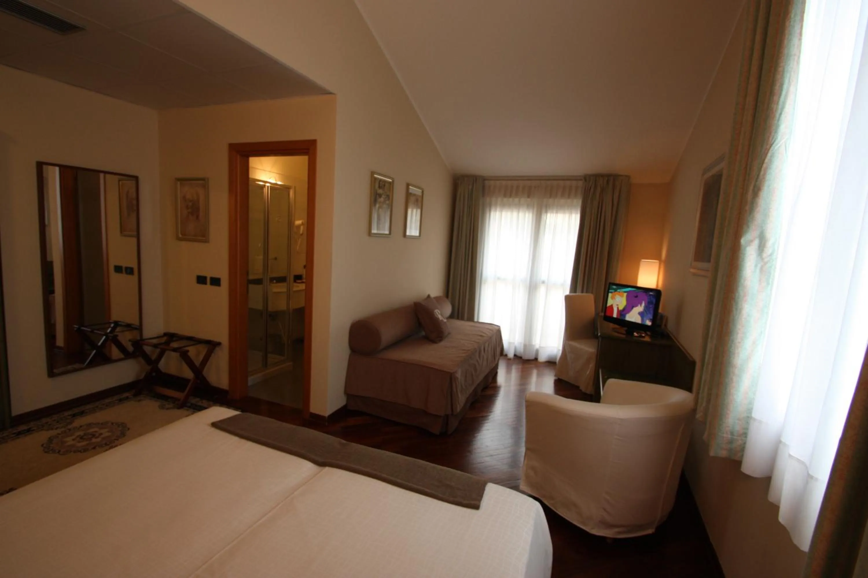Photo of the whole room, Bed in Albergo Della Roccia