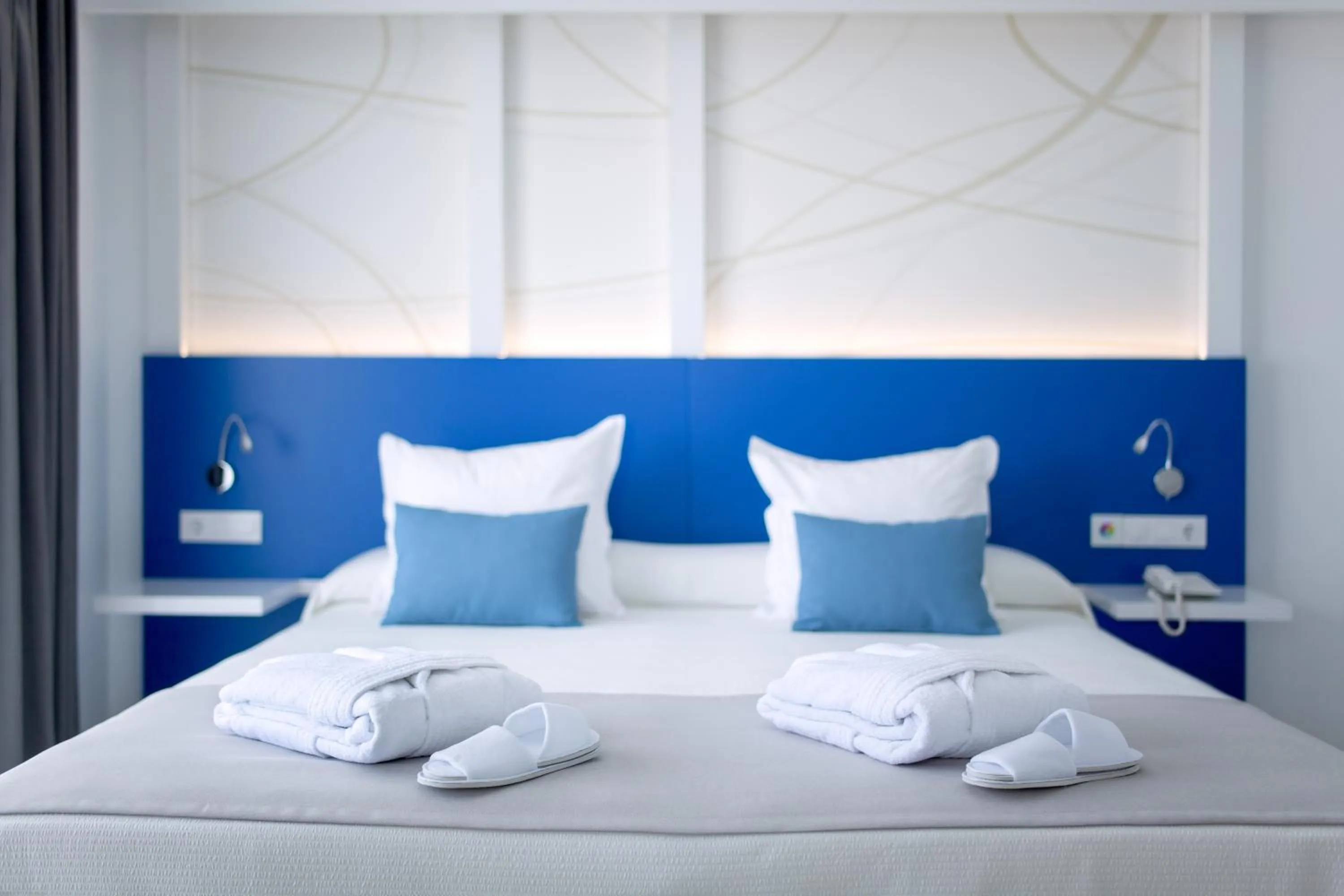 Bed in Playaolid Suites & Apartments