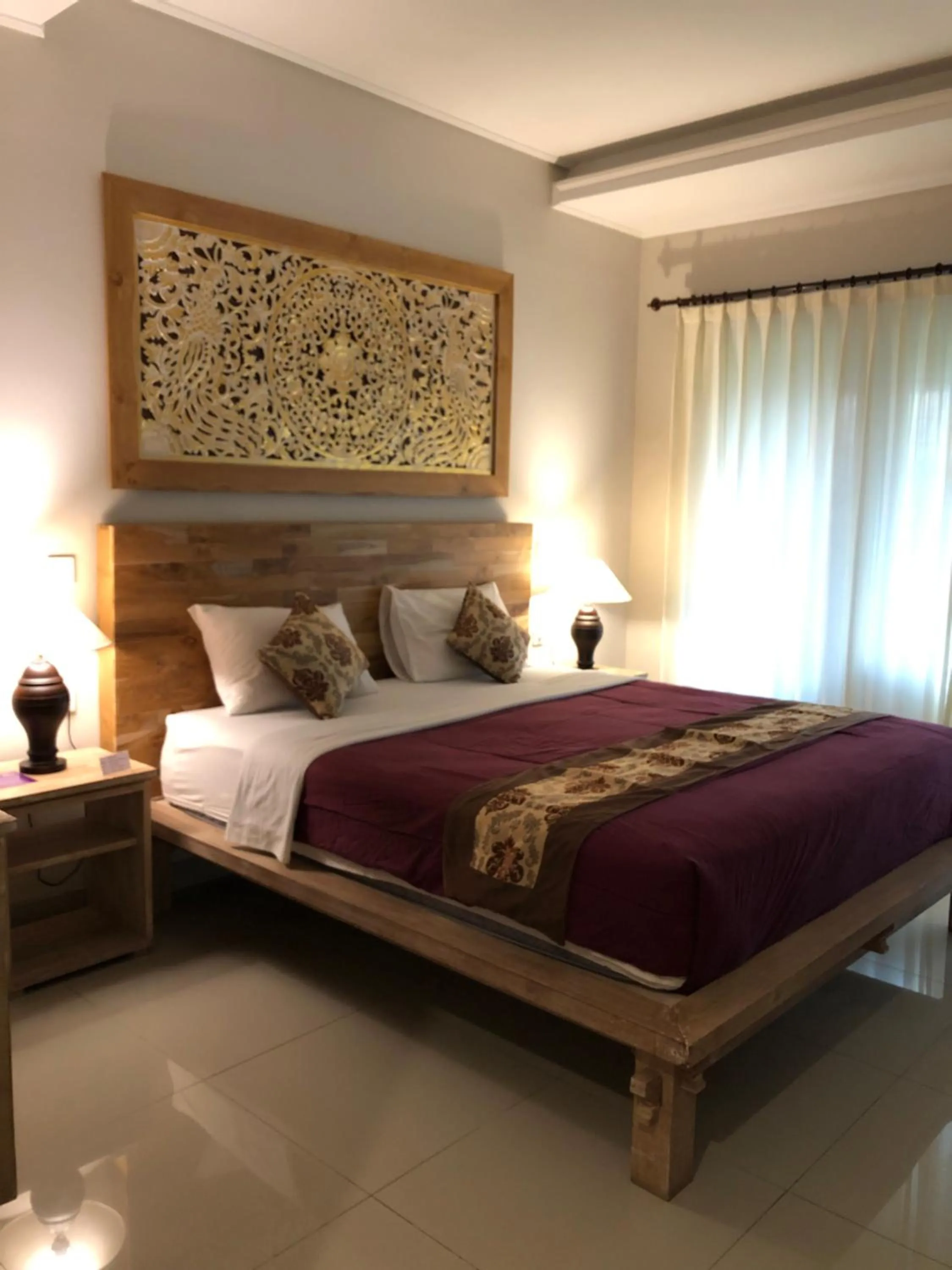 Bed in Betutu Bali Villas