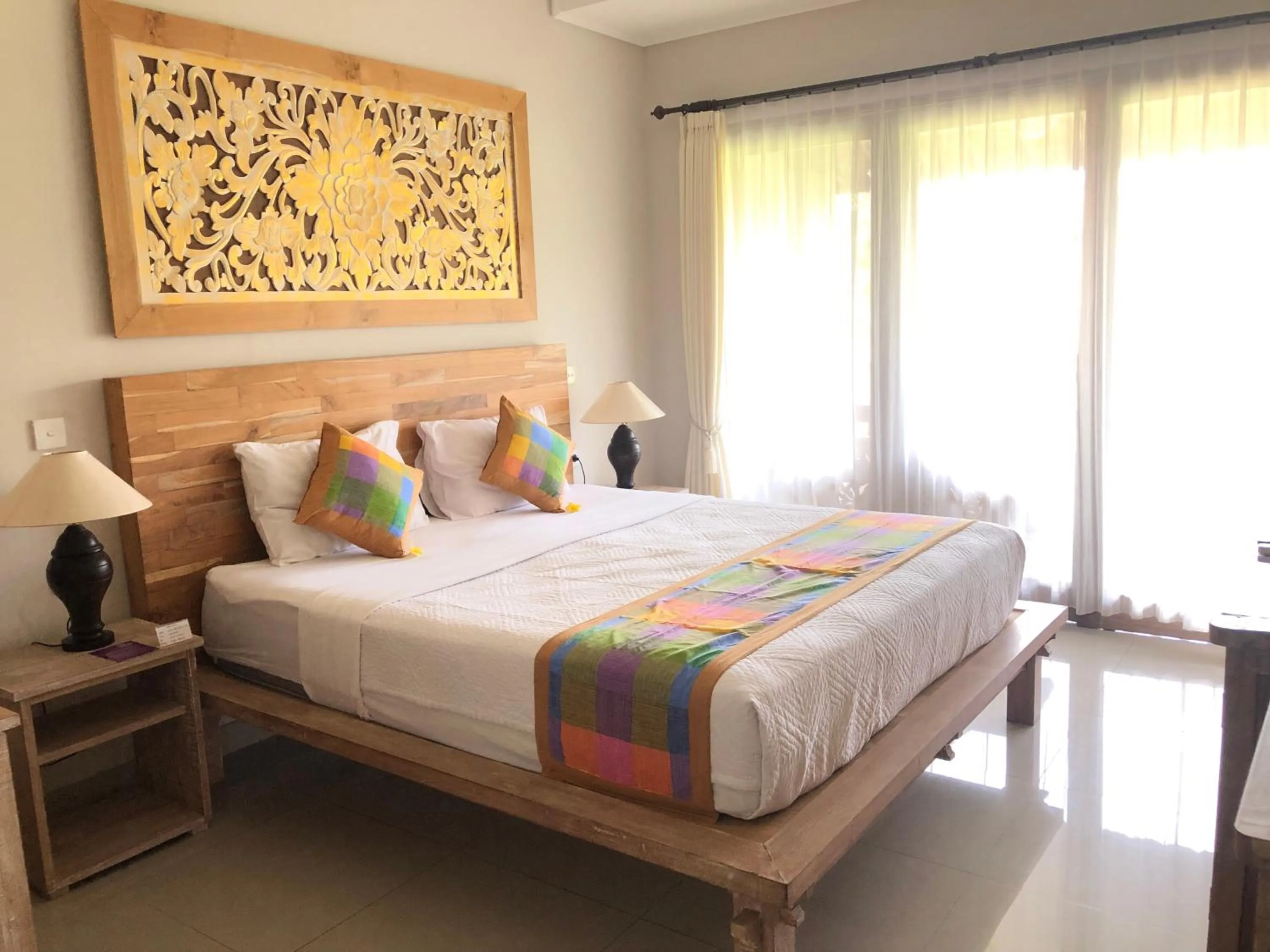 Bed in Betutu Bali Villas