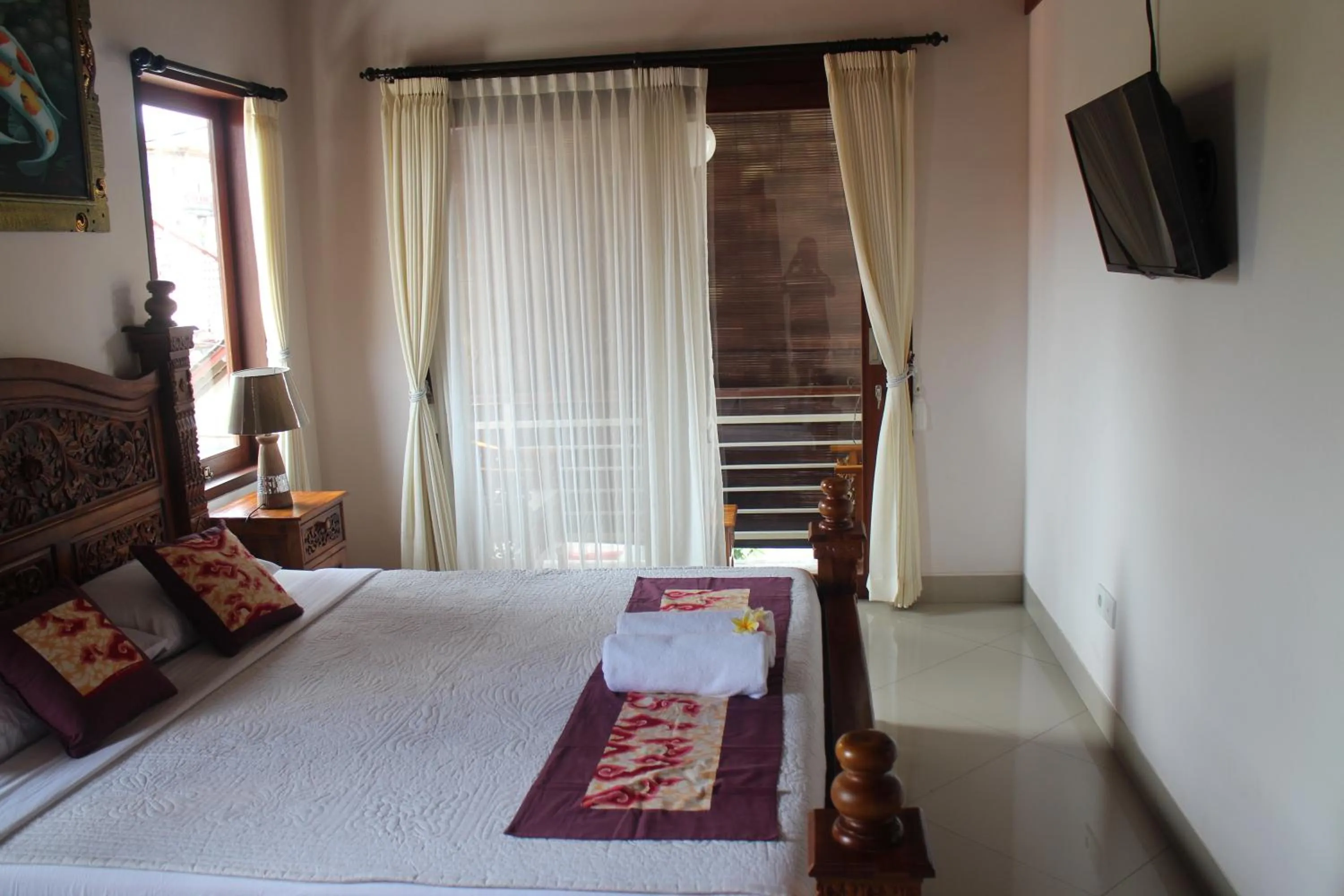 Bed in Betutu Bali Villas