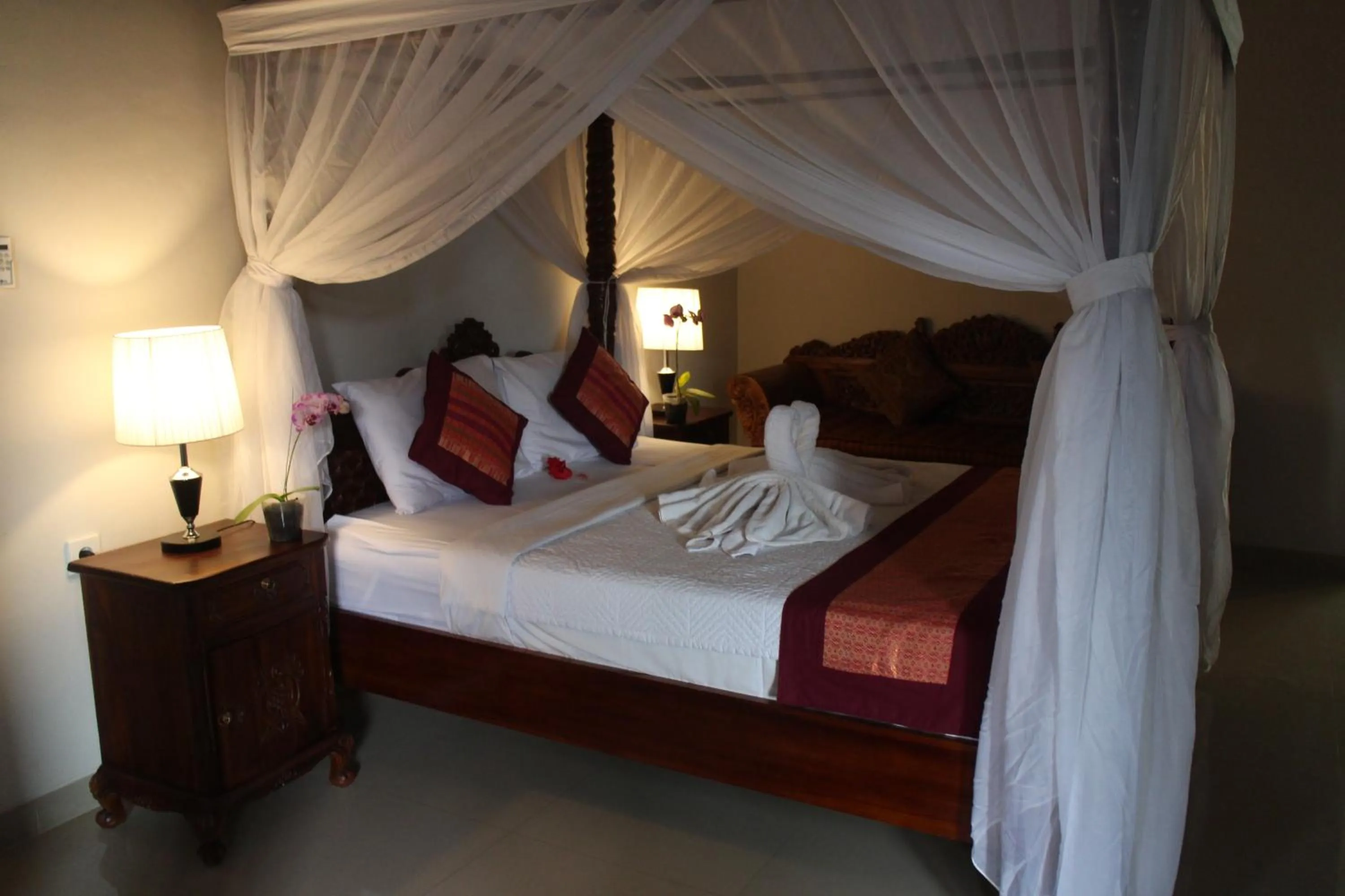 Bed in Betutu Bali Villas