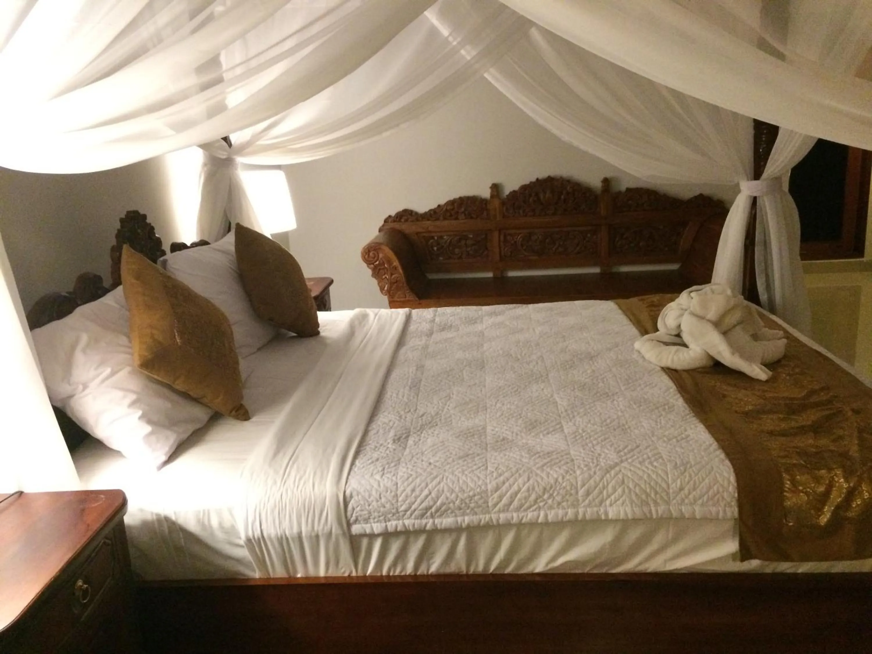 Bed in Betutu Bali Villas