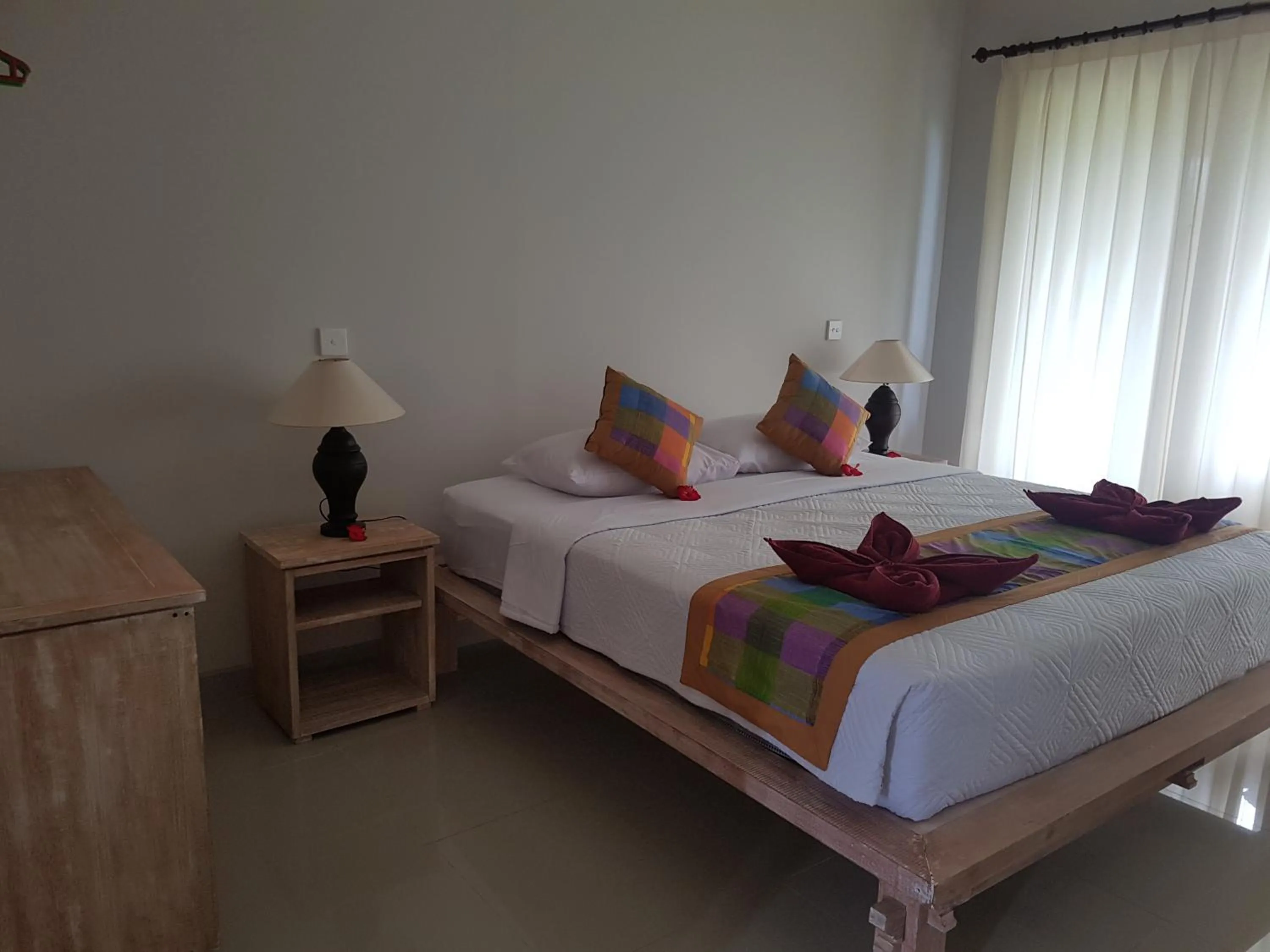 Bed in Betutu Bali Villas