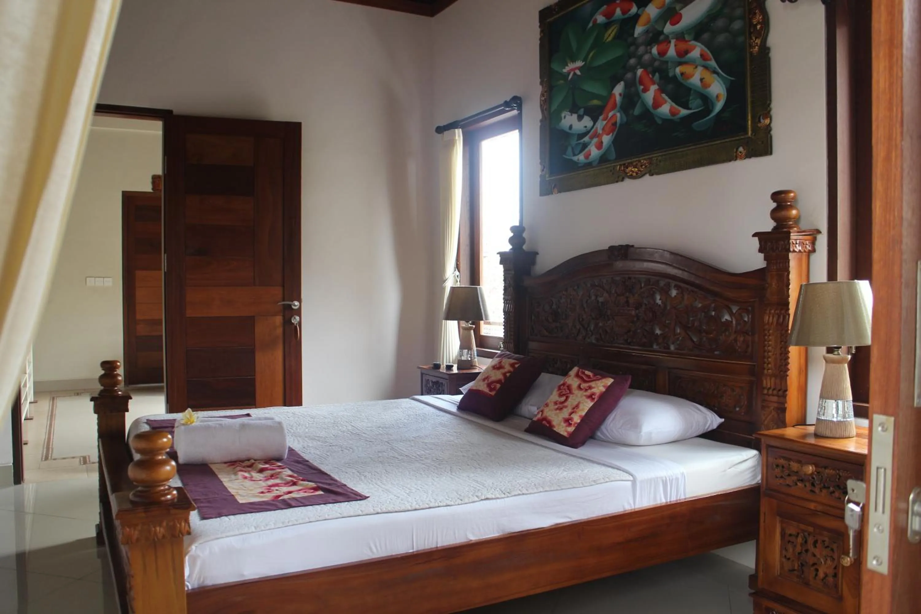 Bed in Betutu Bali Villas