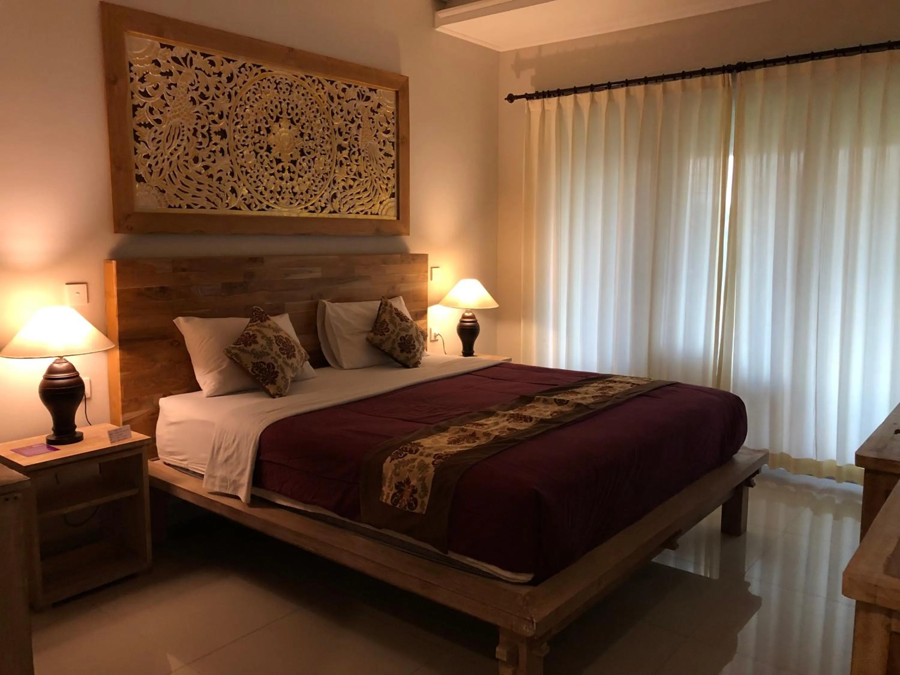Bed in Betutu Bali Villas