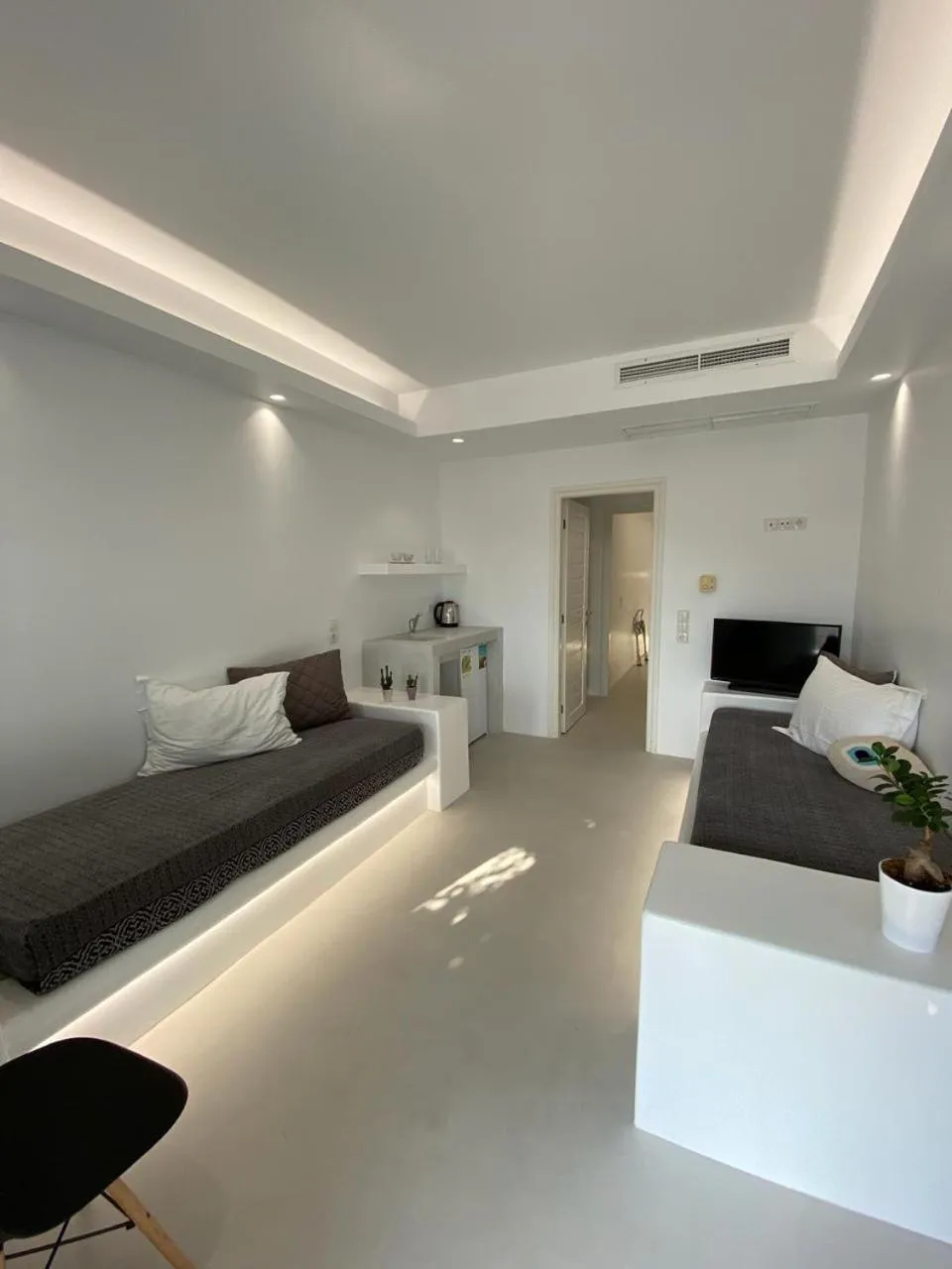 Bed in Alexandros Apartments