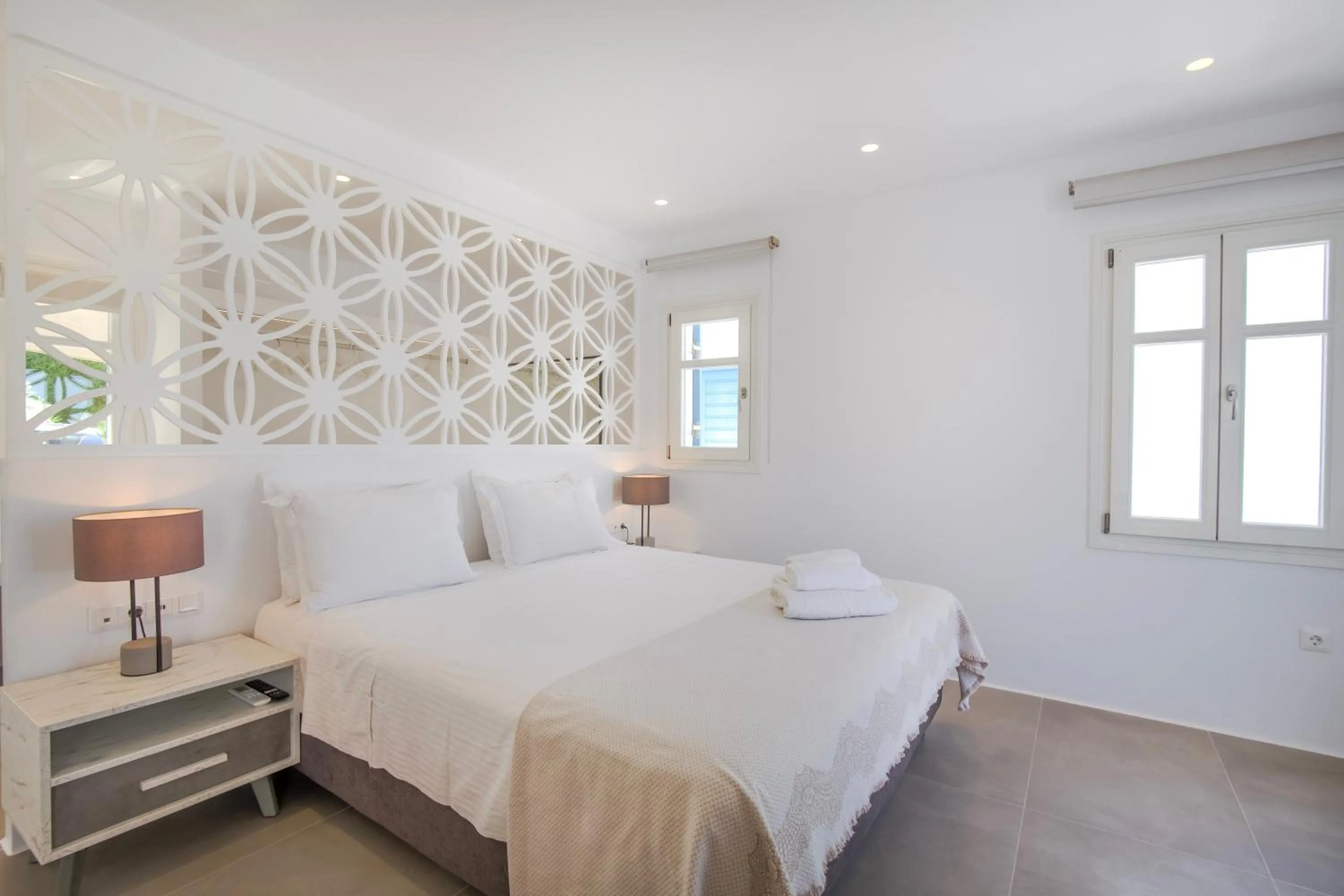 Bed in Alexandros Apartments