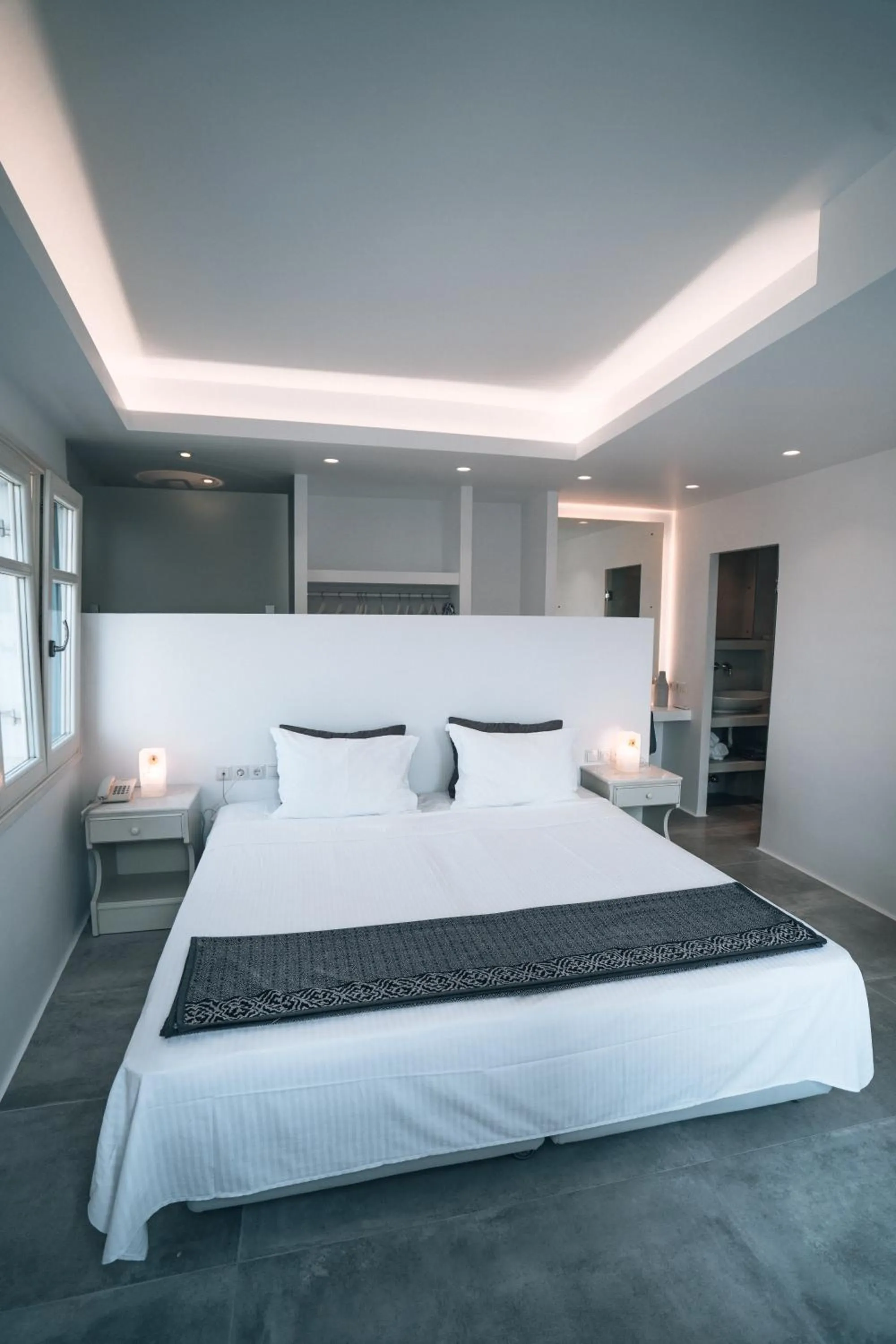 Bed in Alexandros Apartments