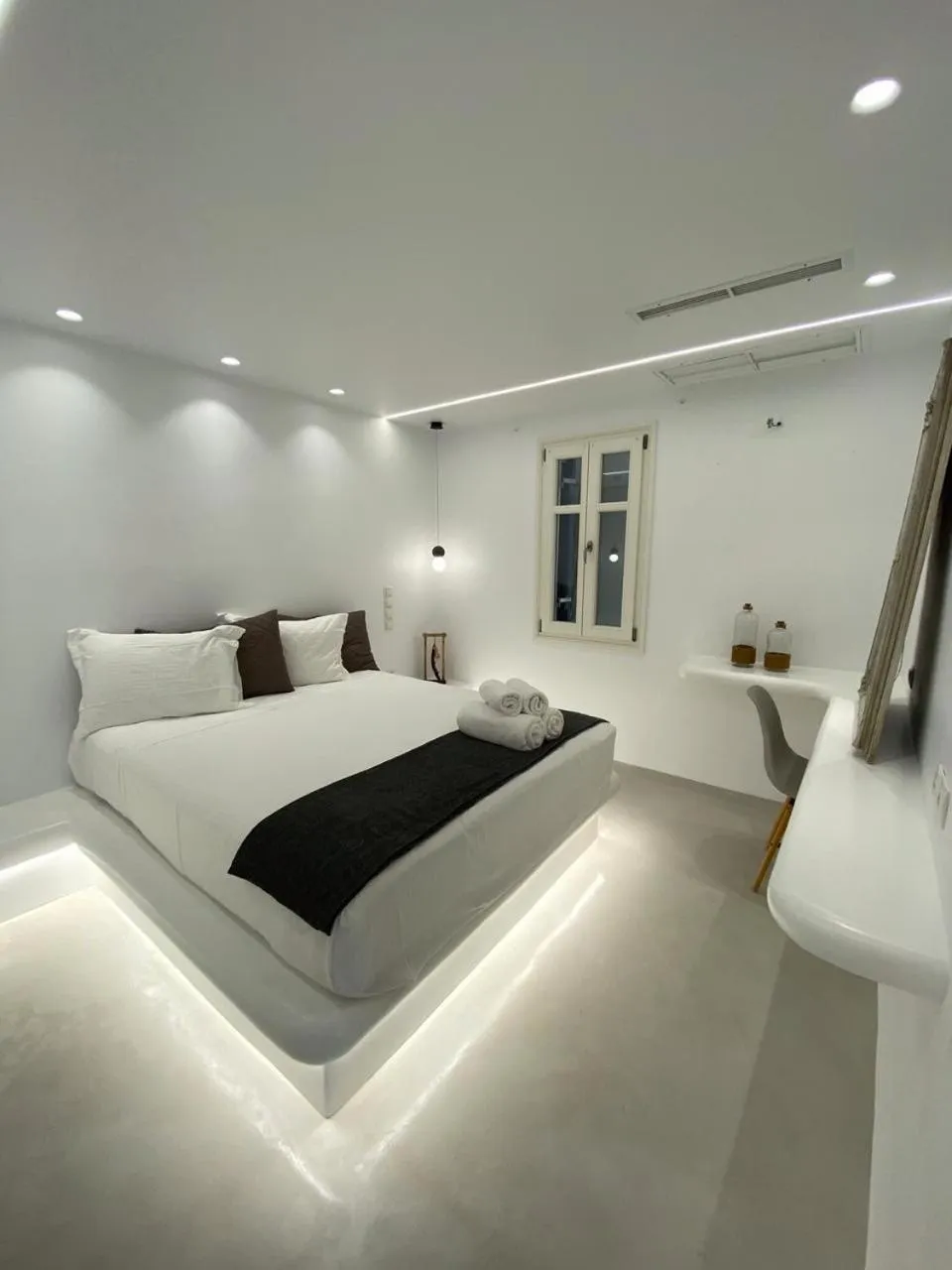 Bed in Alexandros Apartments