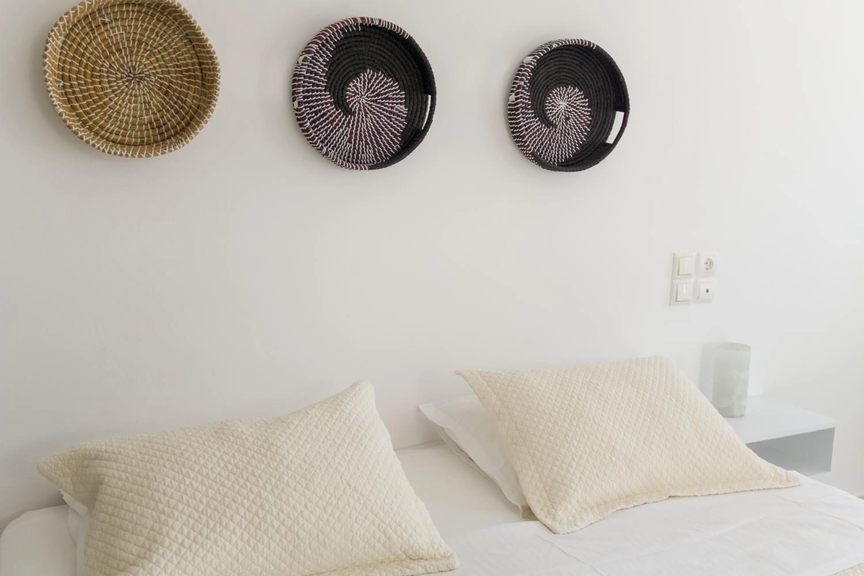 Bed in Alexandros Apartments