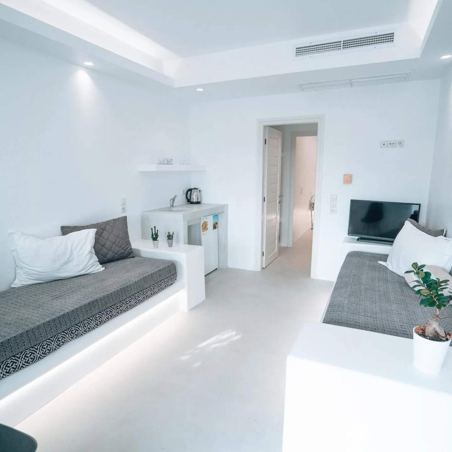 Bed in Alexandros Apartments