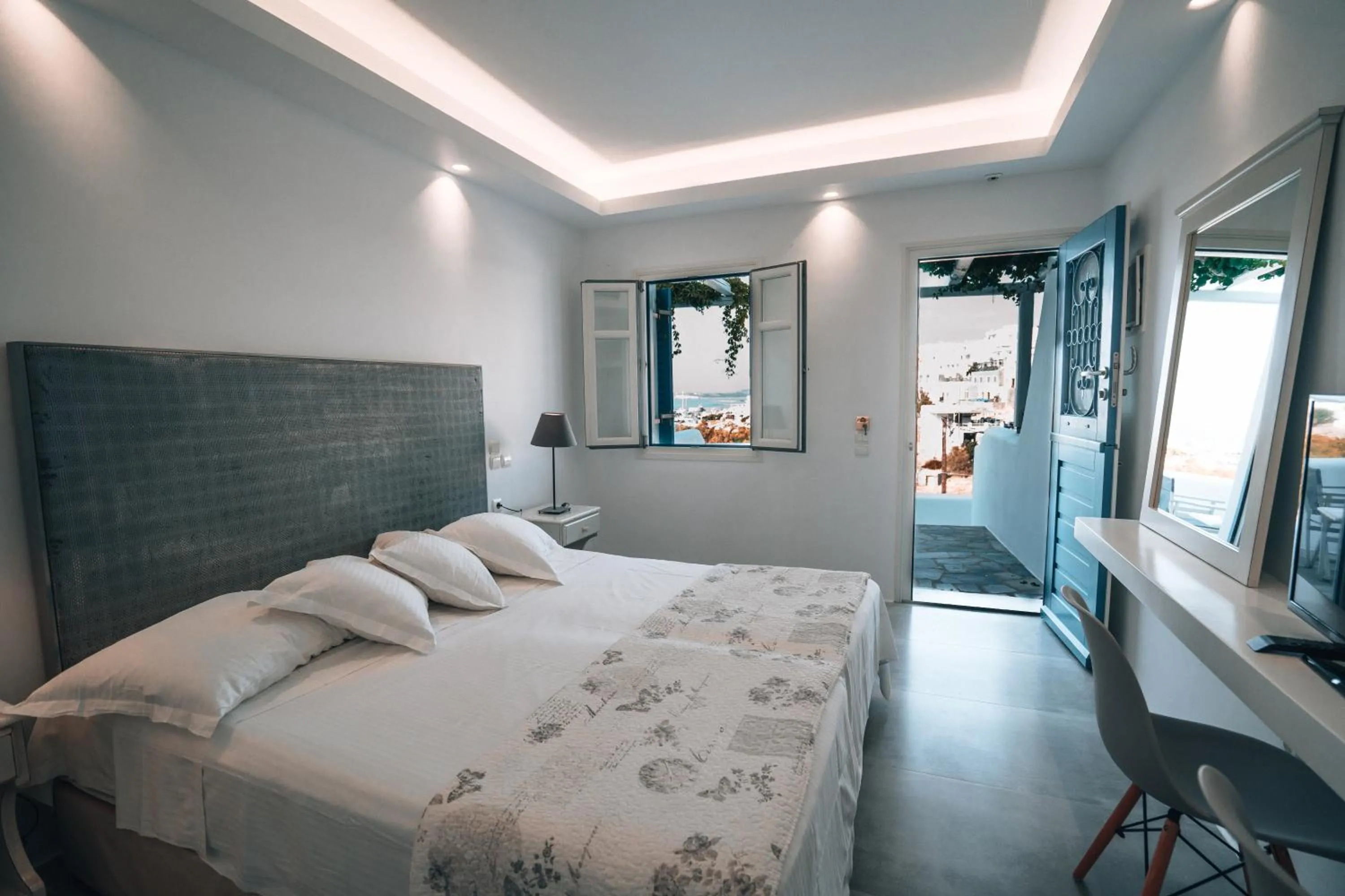 Bed in Alexandros Apartments