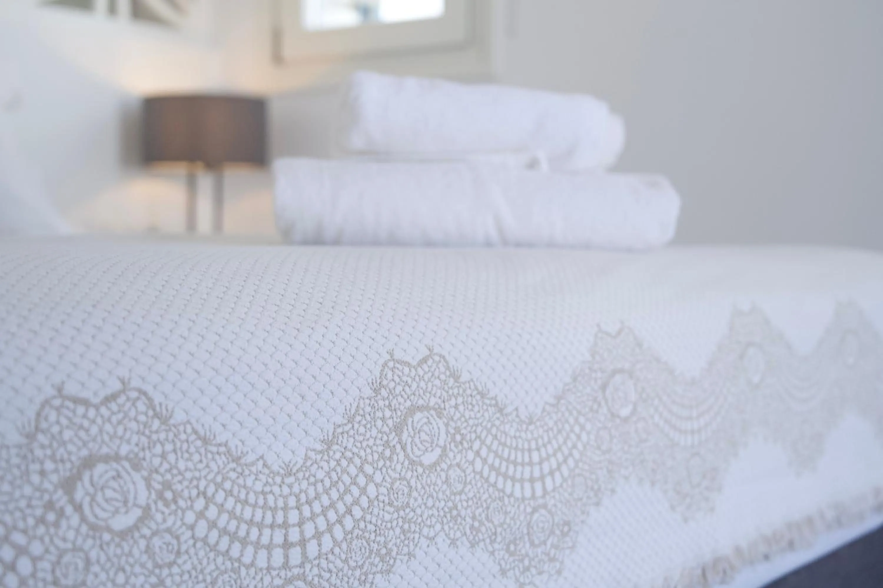 Bed in Alexandros Apartments