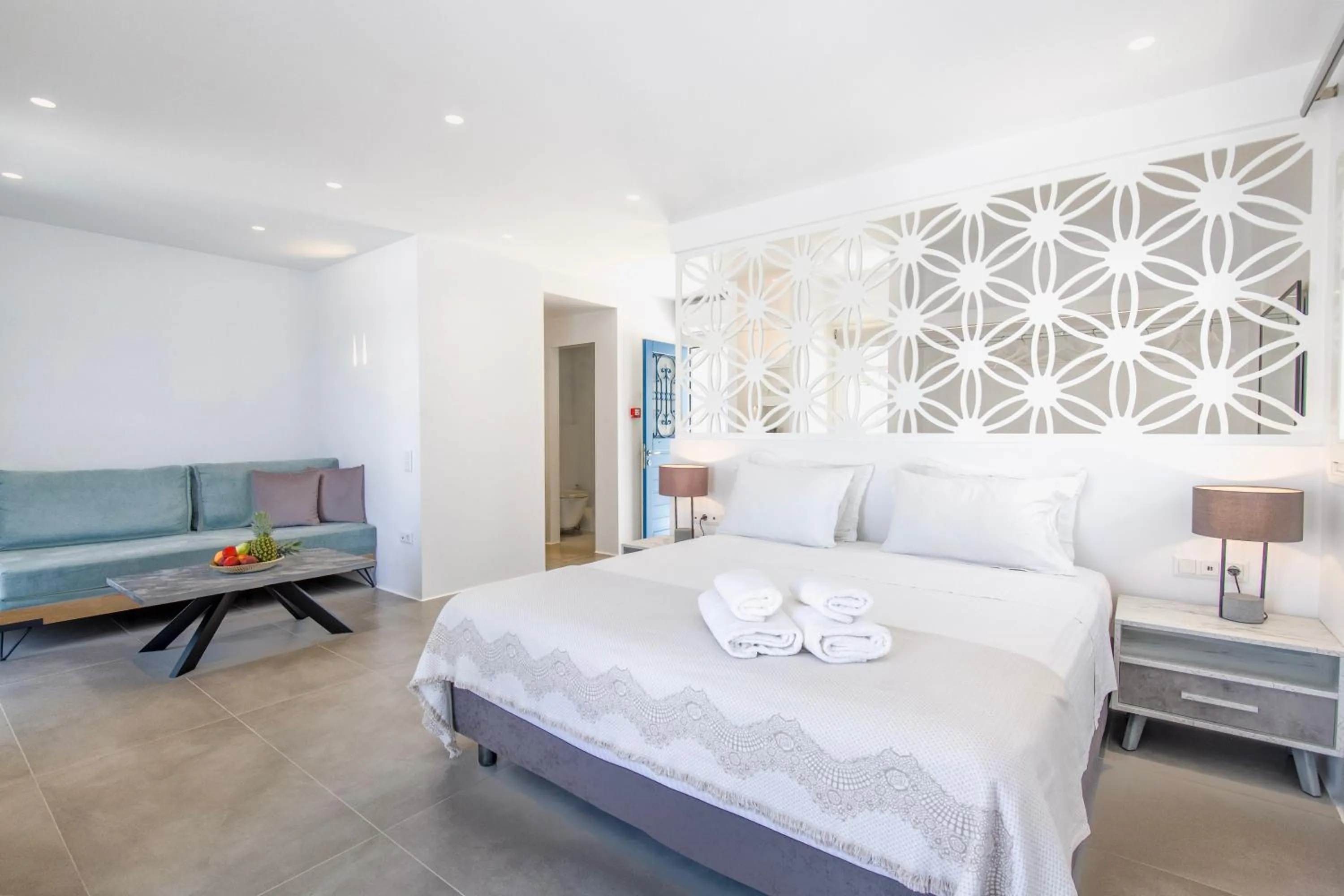 Bed in Alexandros Apartments