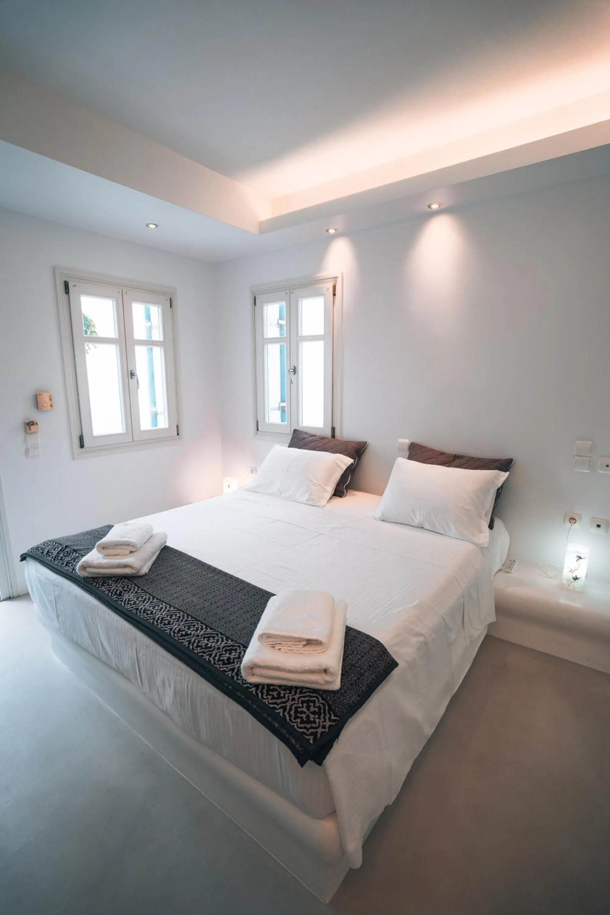 Bed in Alexandros Apartments