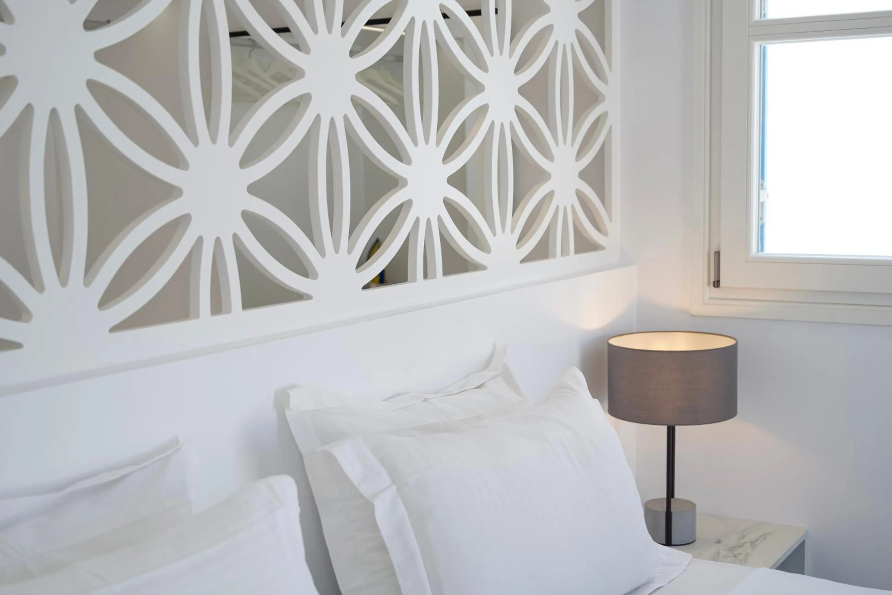 Bed in Alexandros Apartments