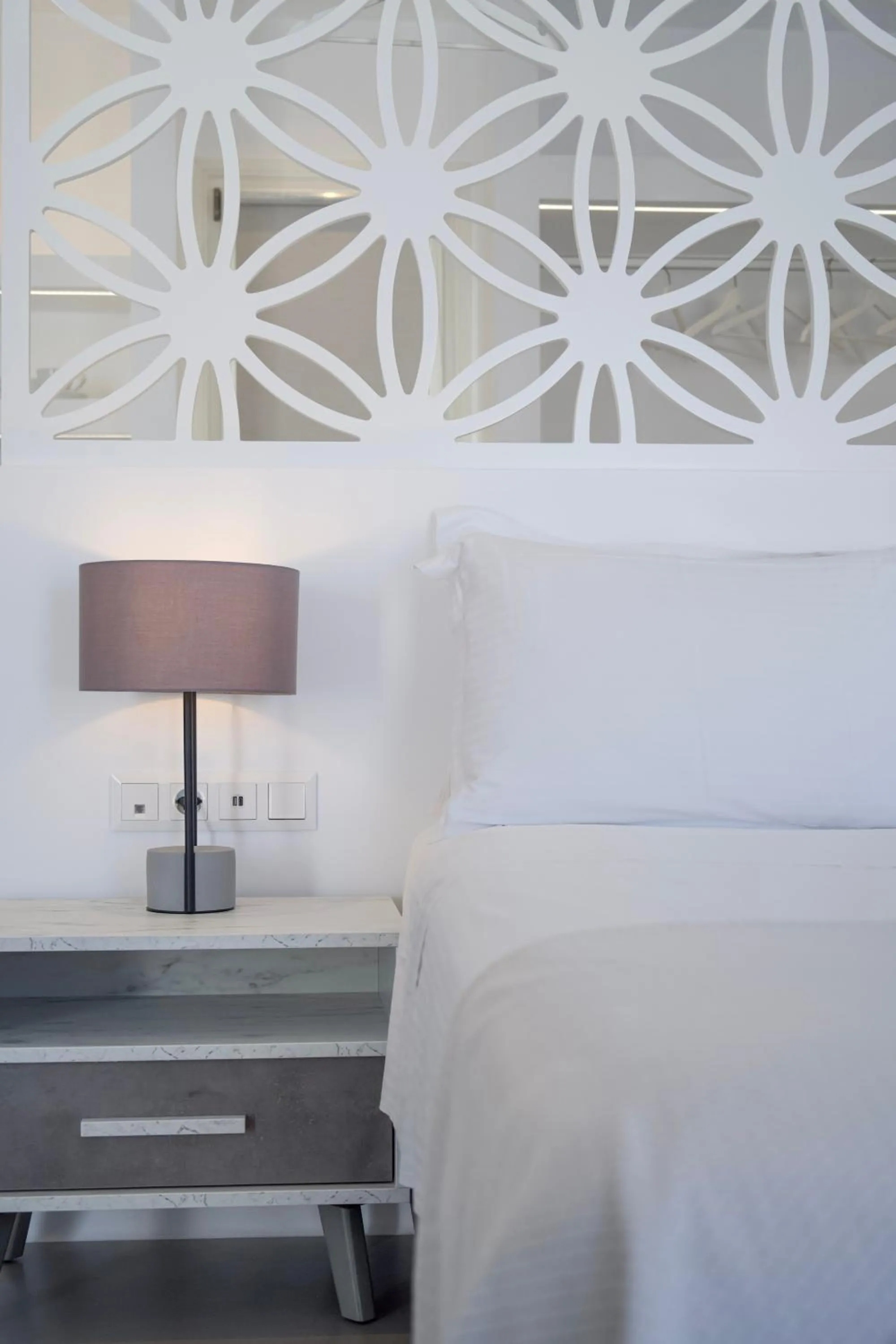 Bed in Alexandros Apartments