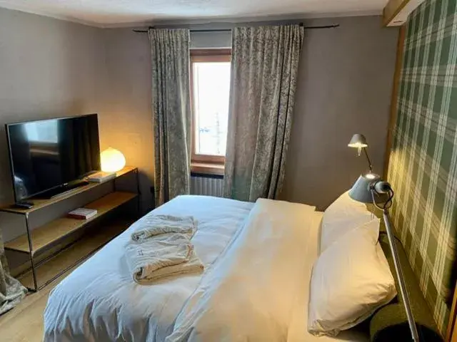 Family Room with Spa Access in Les Neiges D'Antan Family Room with Spa Access in Les Neiges D'Antan