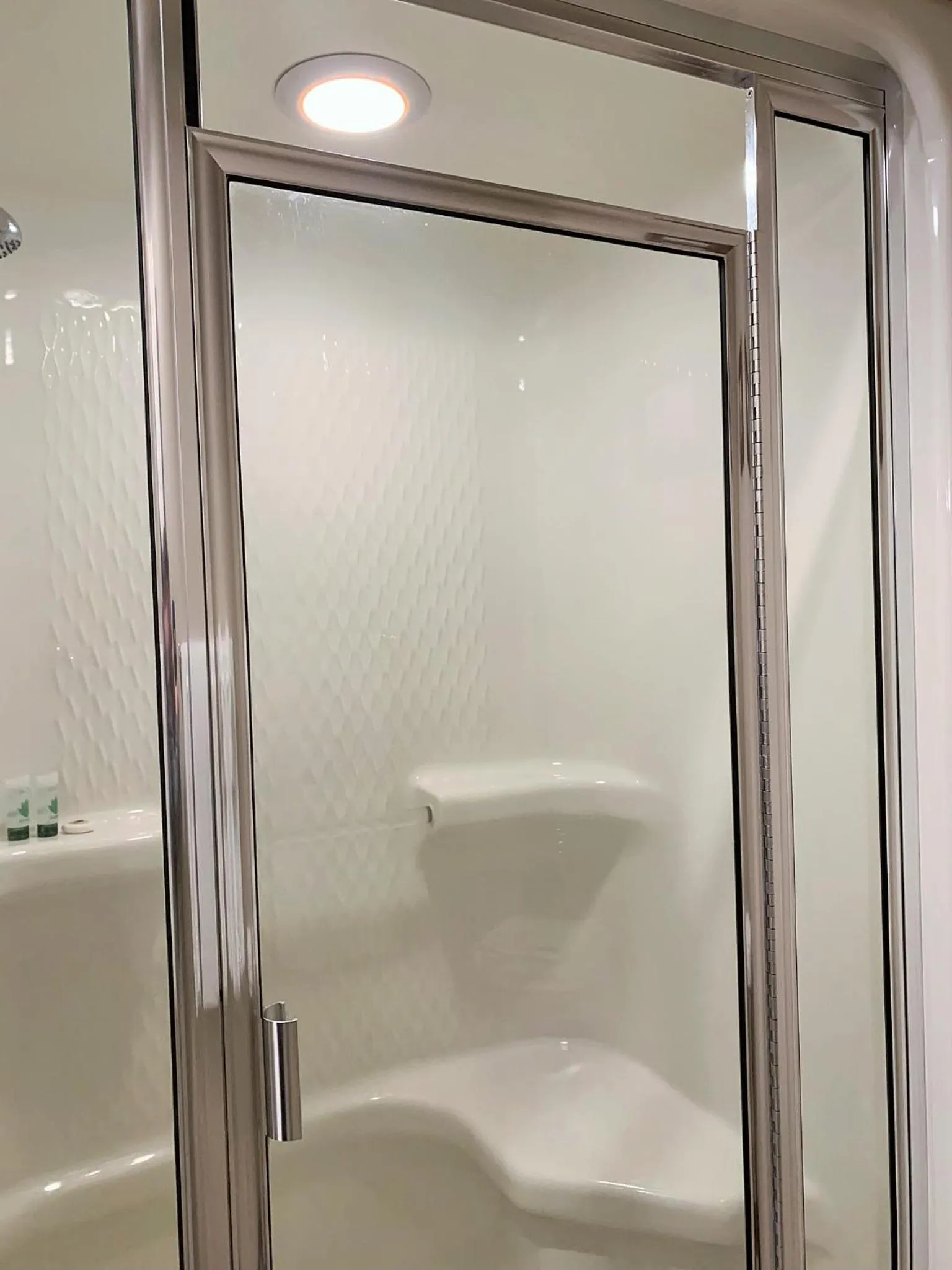 Shower in Breakers Boutique Inn