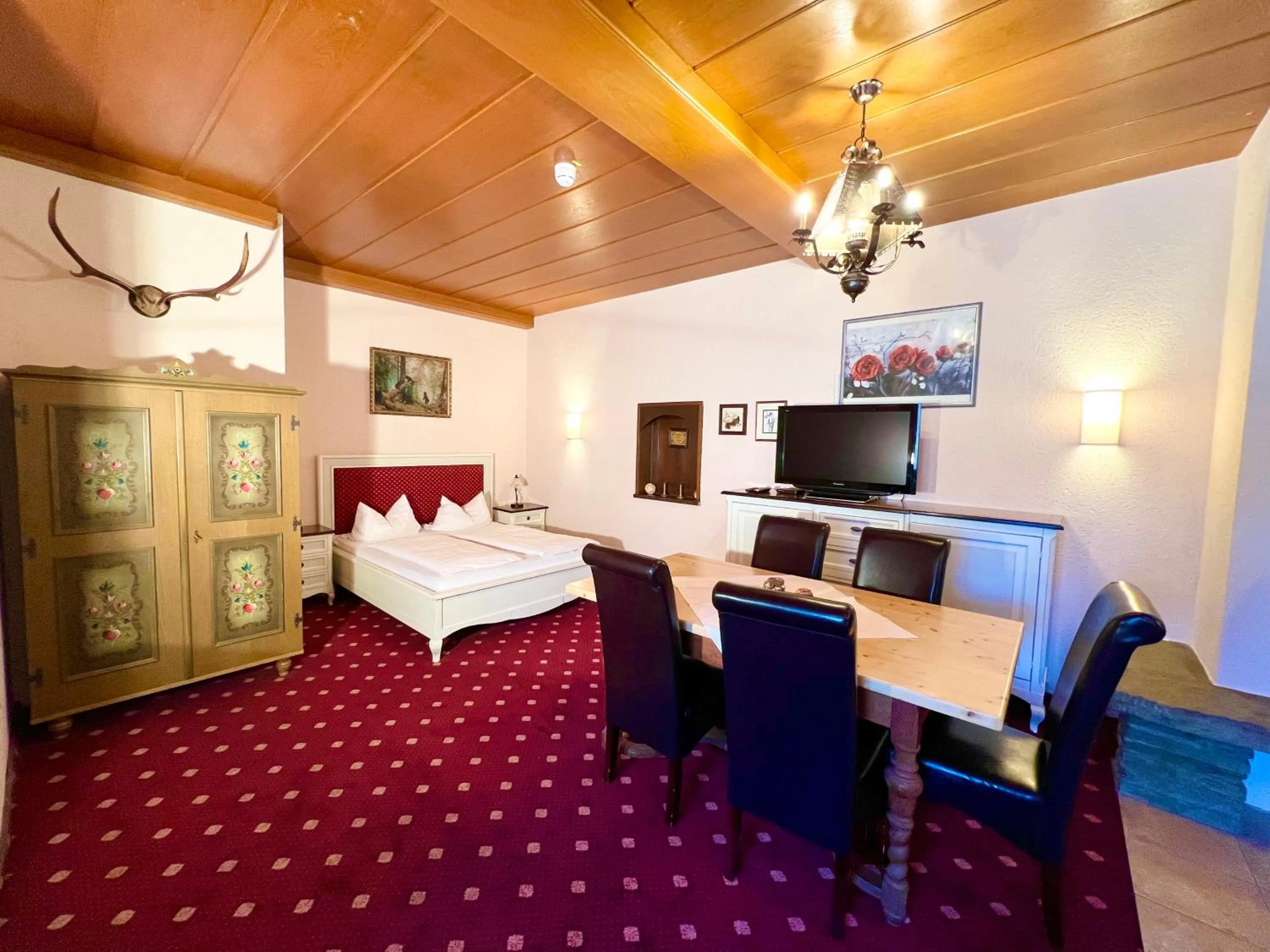 Bed in Hotel Bärenstüberl