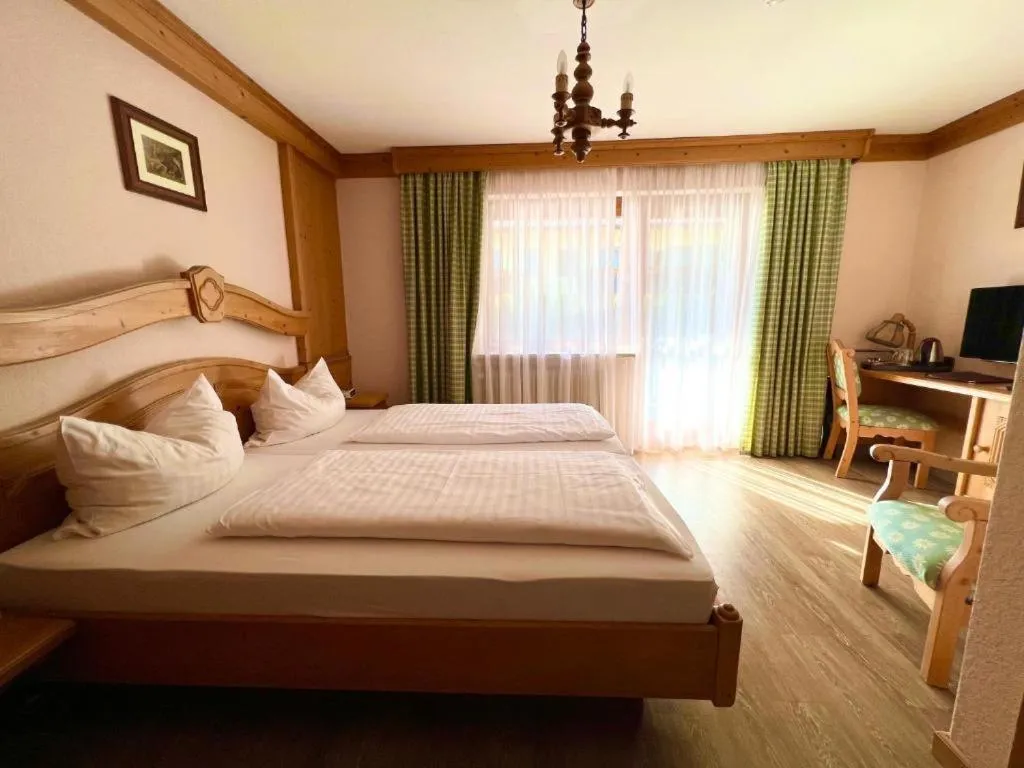 Bed in Hotel Bärenstüberl